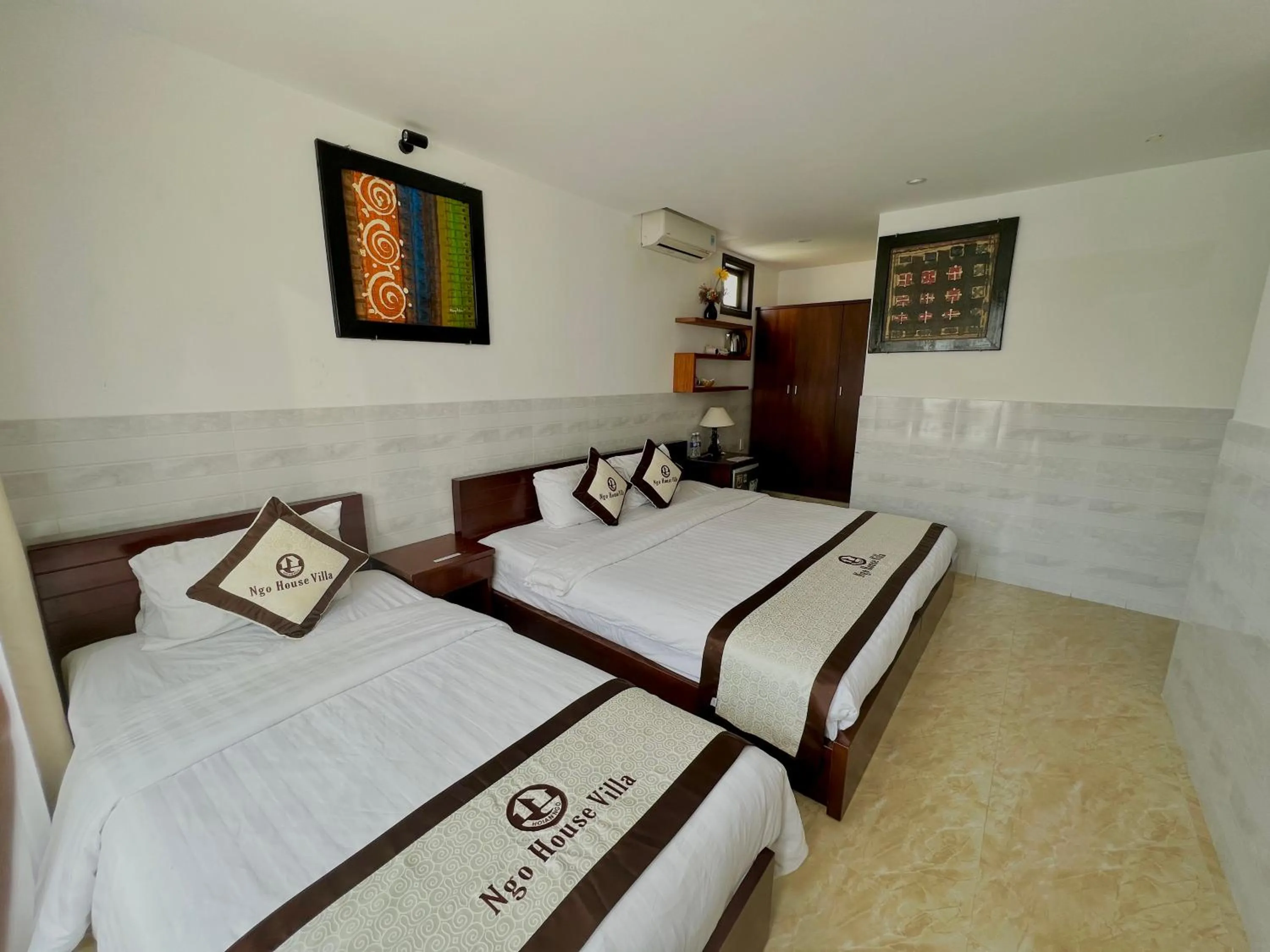 Bed in Ngo House Villa