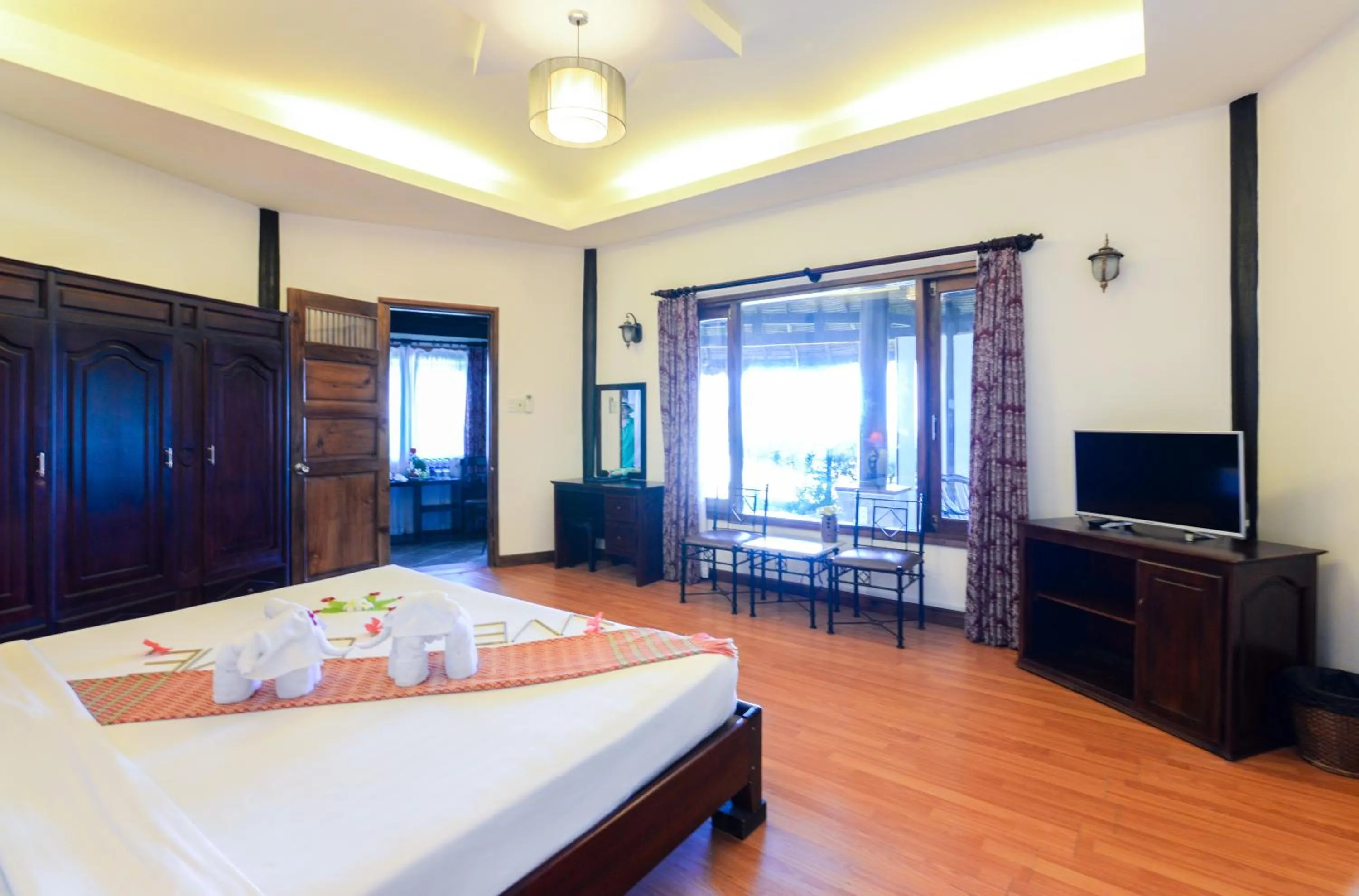 Photo of the whole room, Bed in Four Oceans Beach Resort - Bon Bien Mui Ne
