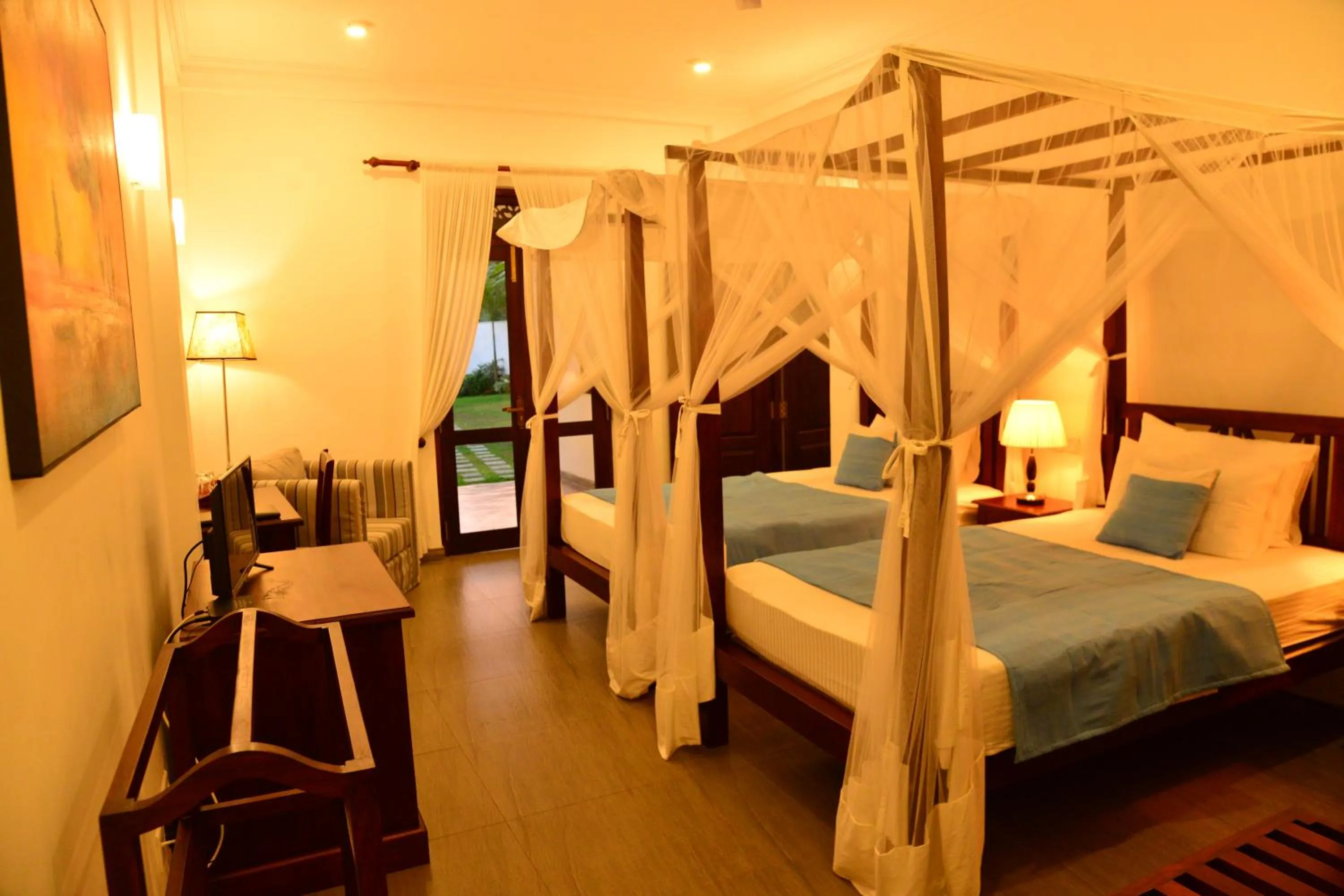 Bed in Boutique Villa Shanthi