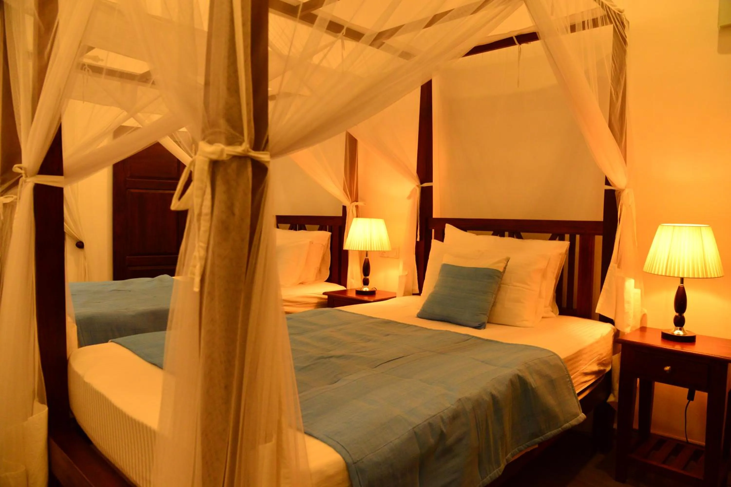 Bed in Boutique Villa Shanthi