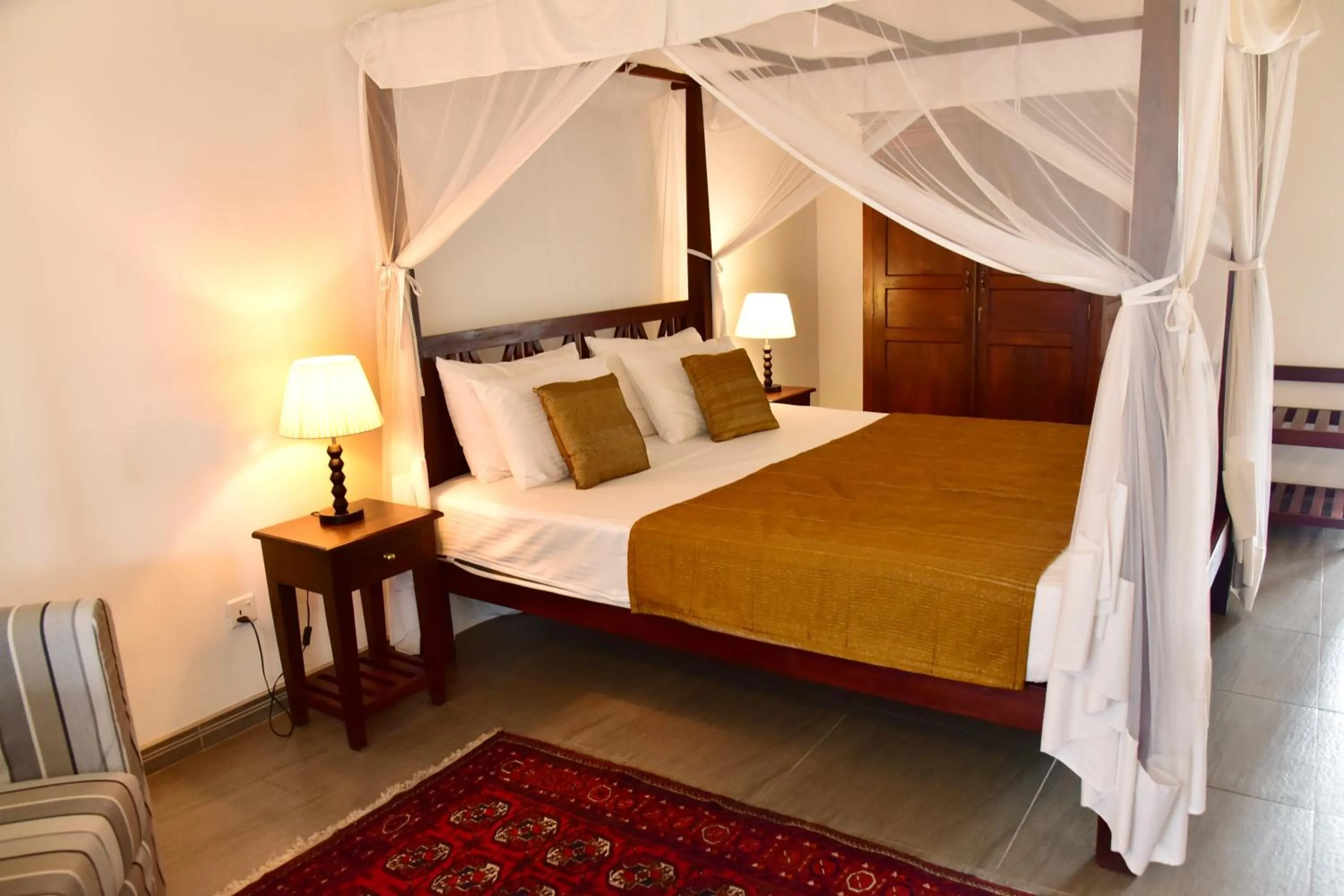 Bed in Boutique Villa Shanthi