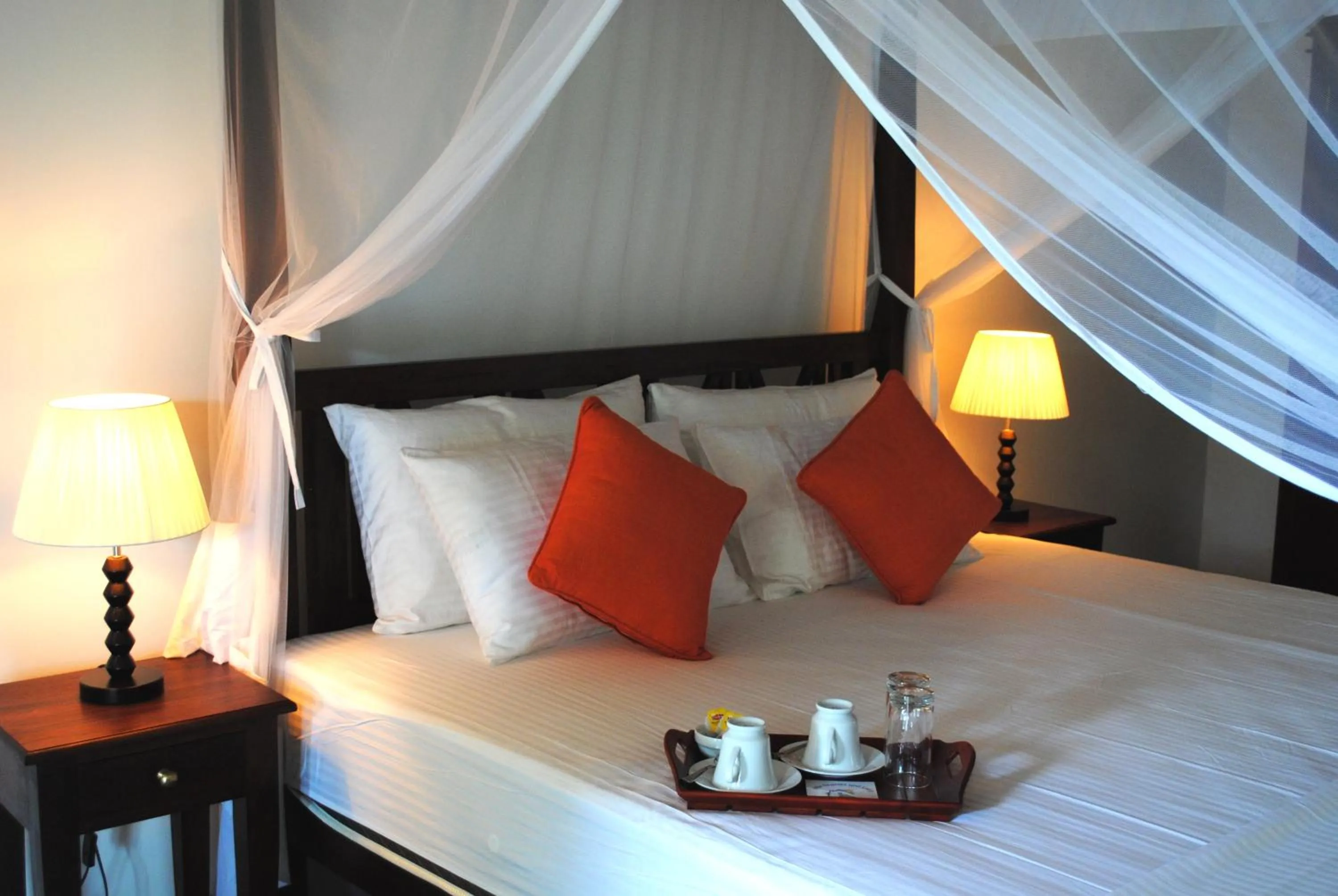 Bed in Boutique Villa Shanthi