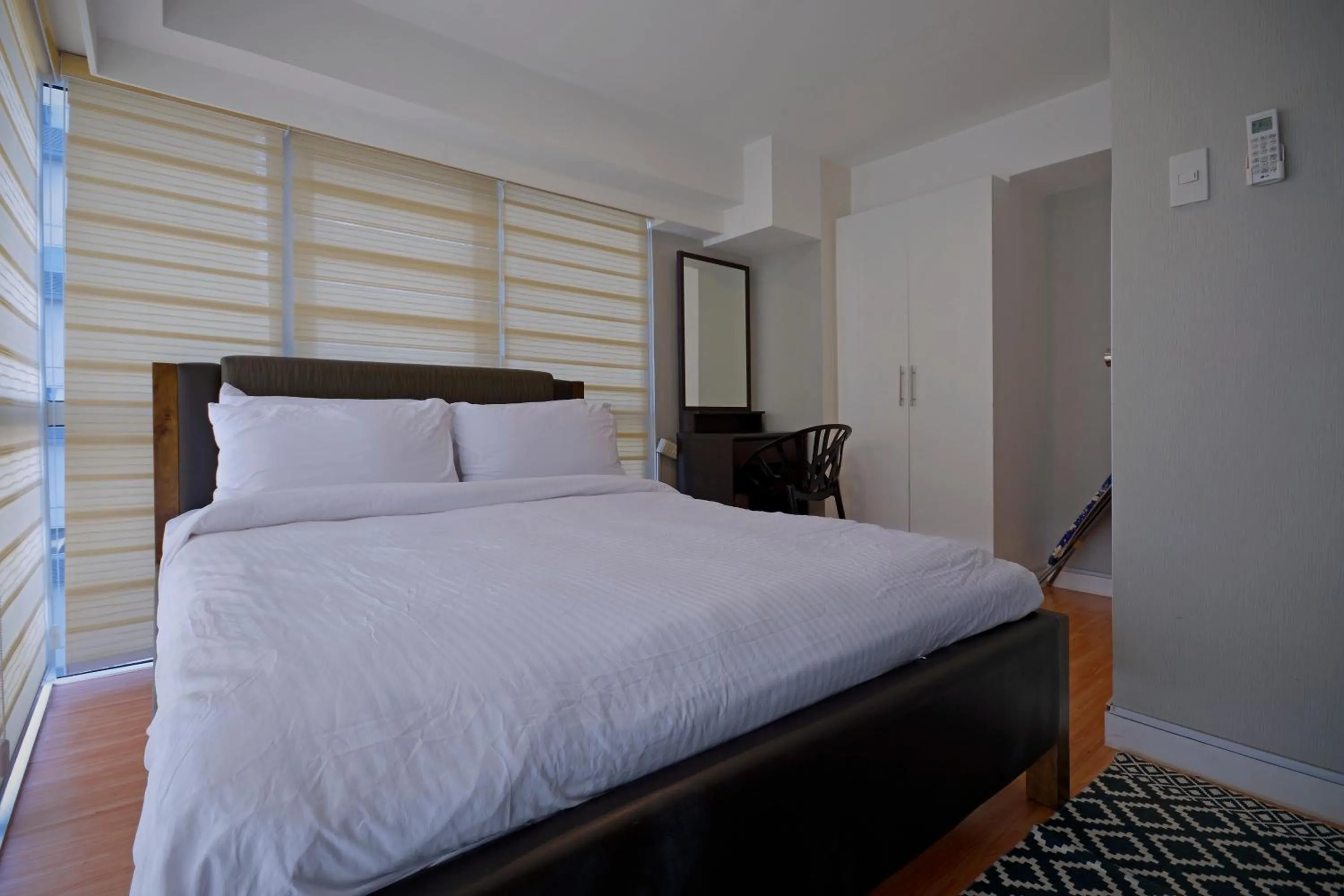 Bed in Victoria SOHO Suites