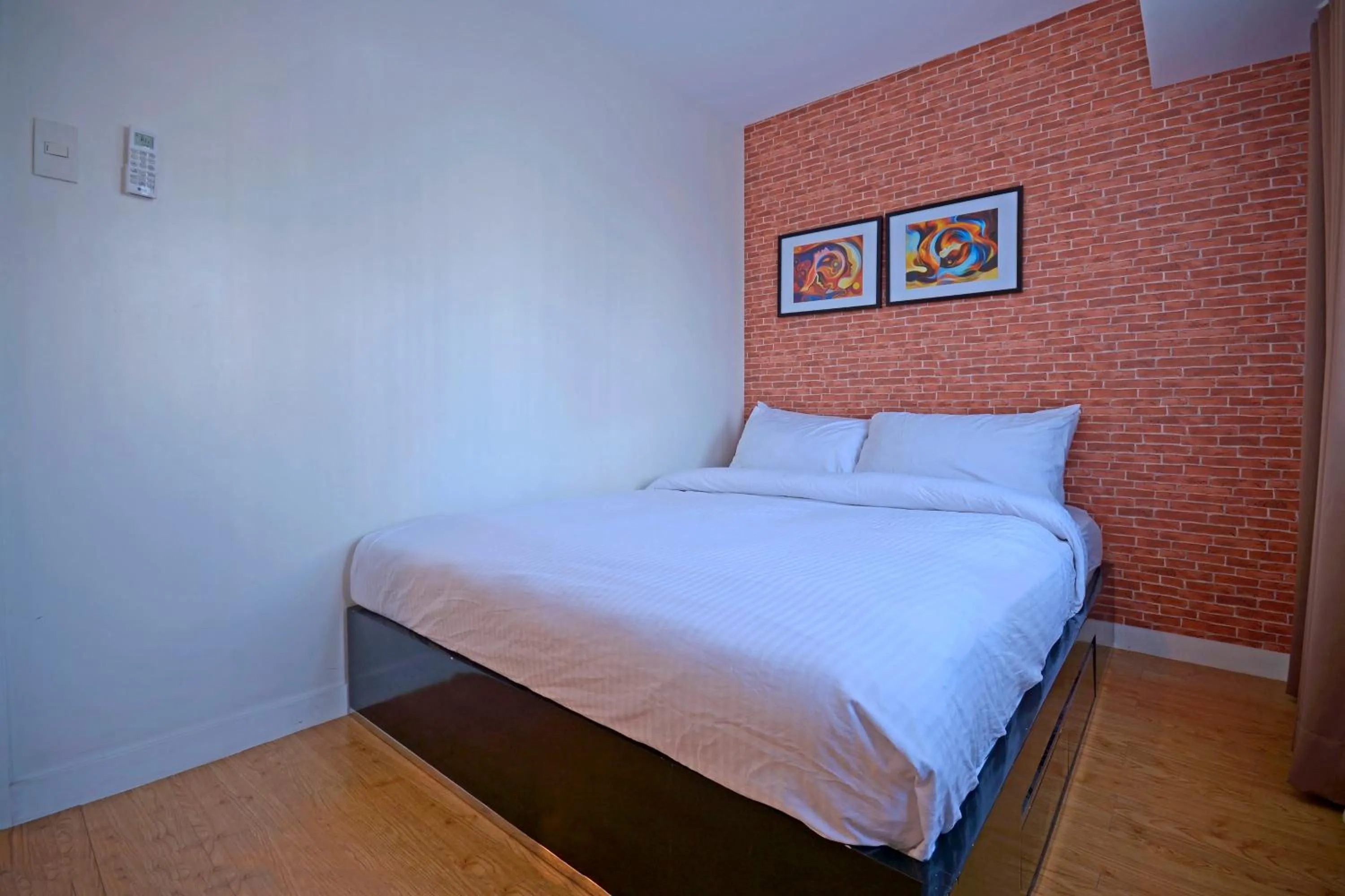 Bed in Victoria SOHO Suites