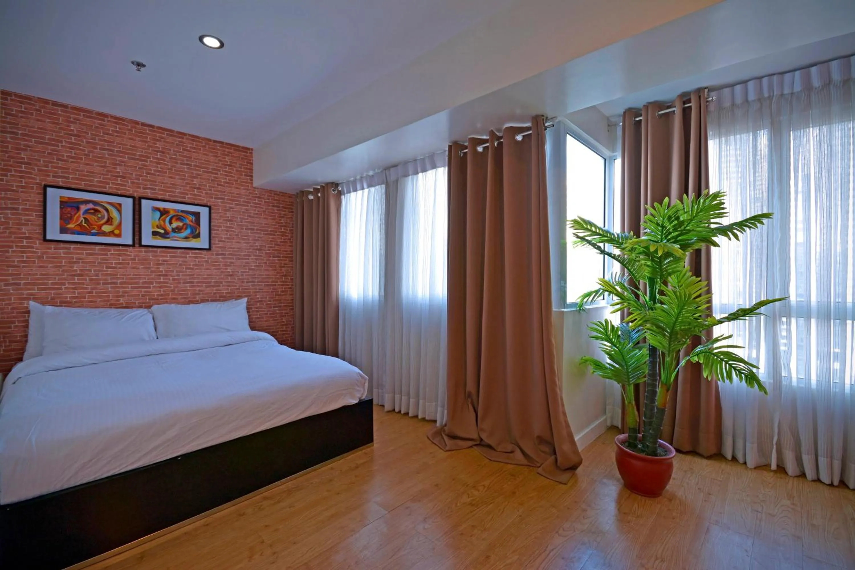 Bed in Victoria SOHO Suites