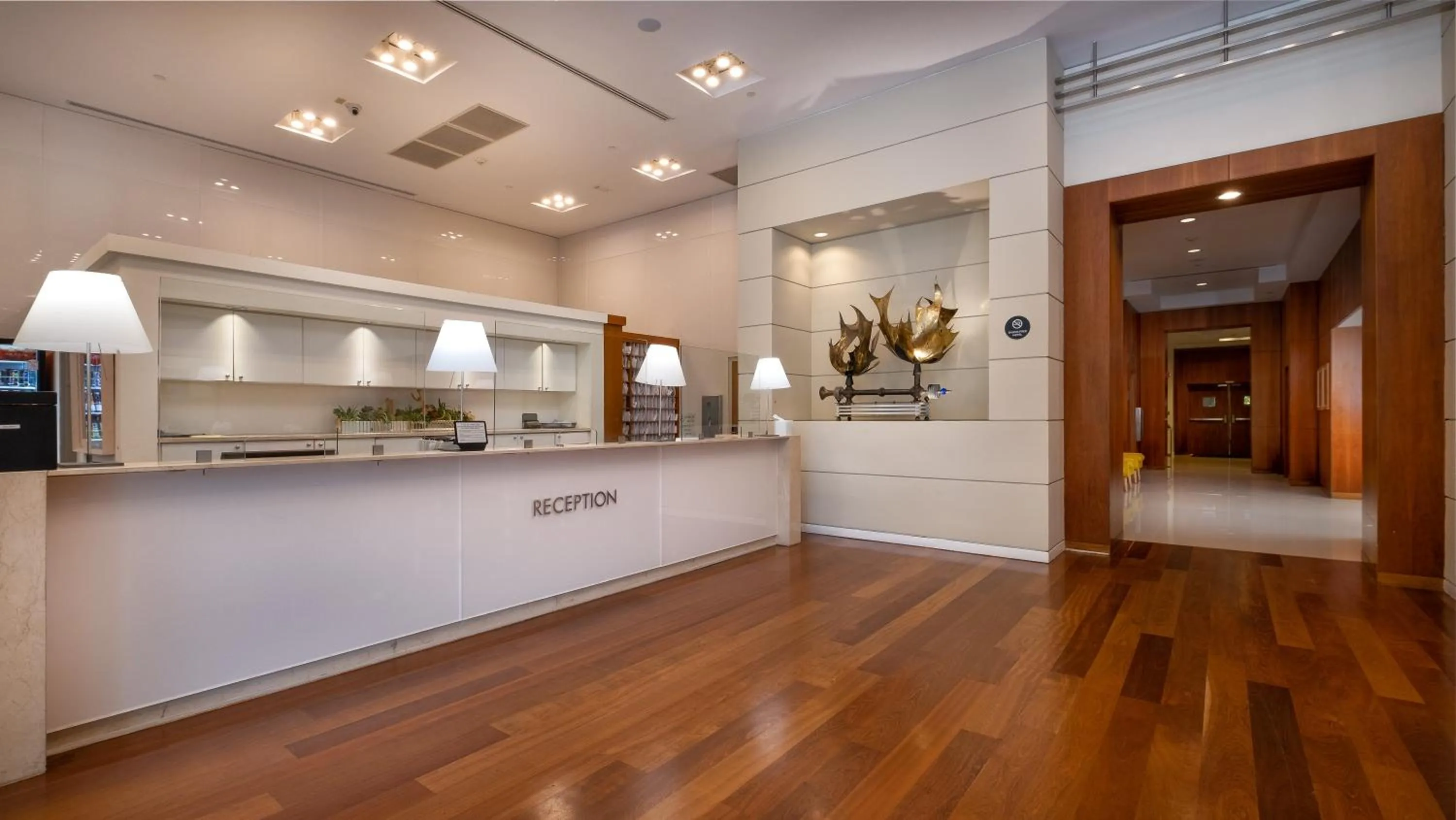 Lobby or reception in Hotel Arya BW Premier Collection