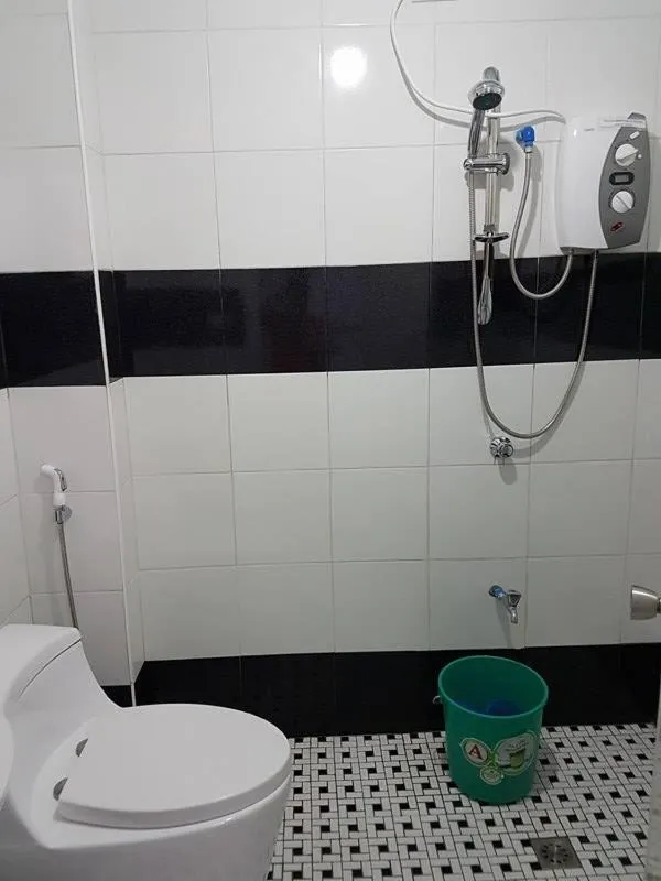 Shower in N&J Lopez Lodging House