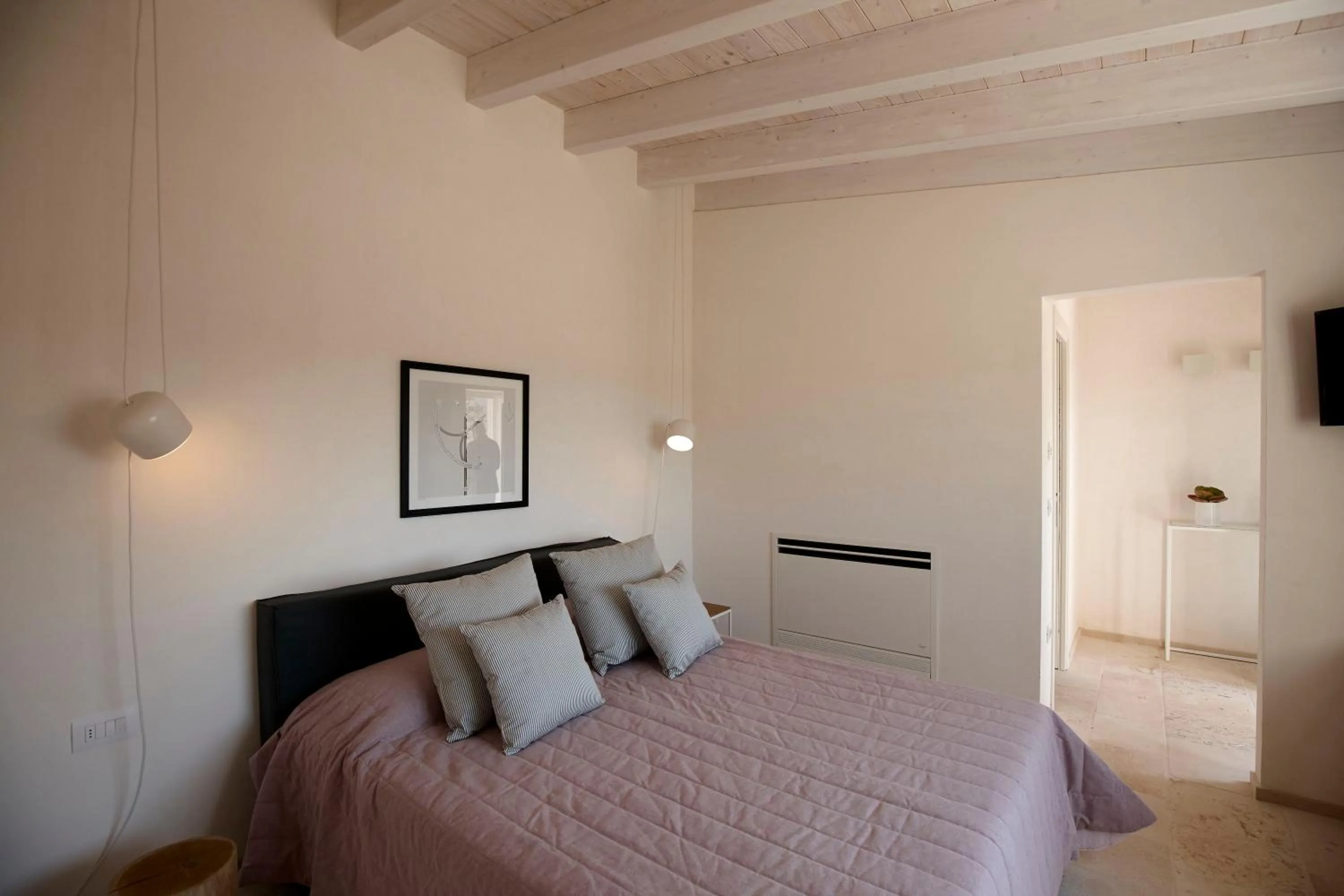 Bed in Villa Torre Bianca by Emily Hotels