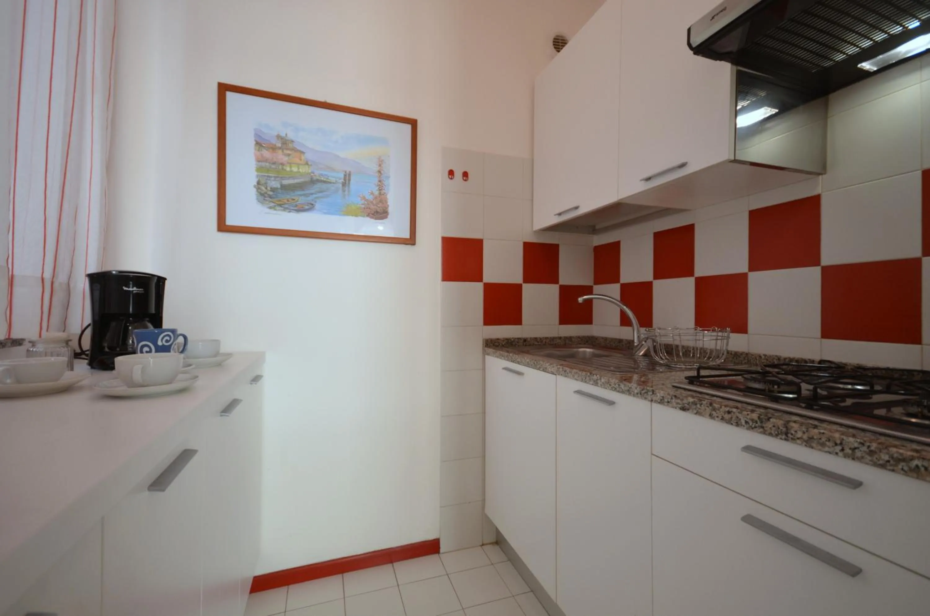 Kitchen or kitchenette in Appartamenti Urano