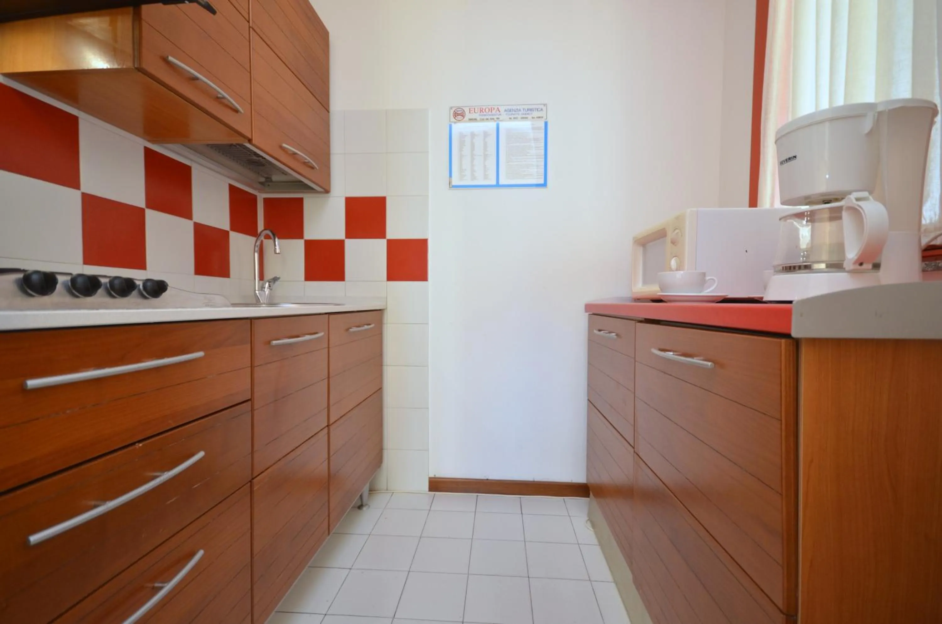 Kitchen or kitchenette in Appartamenti Urano