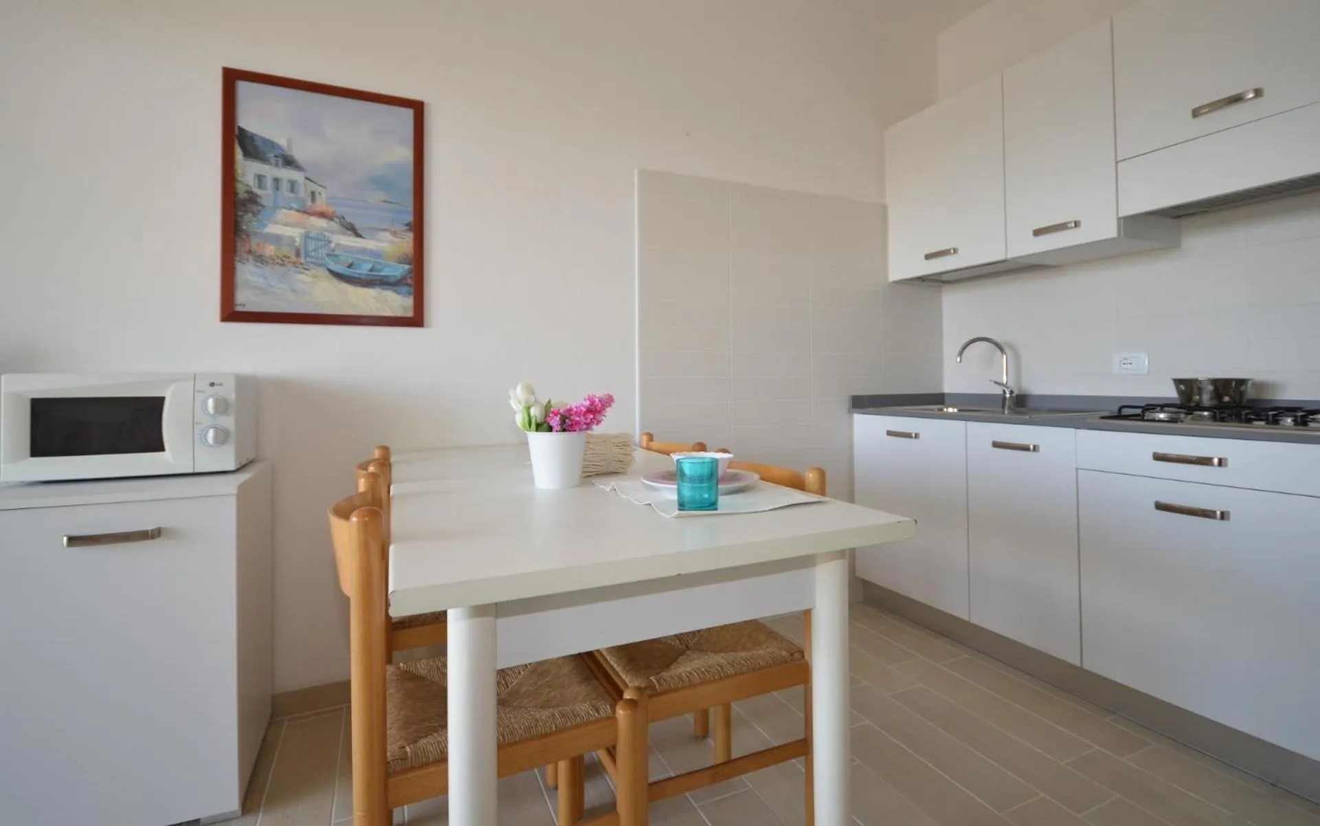 Kitchen or kitchenette in Appartamenti Acquaverde