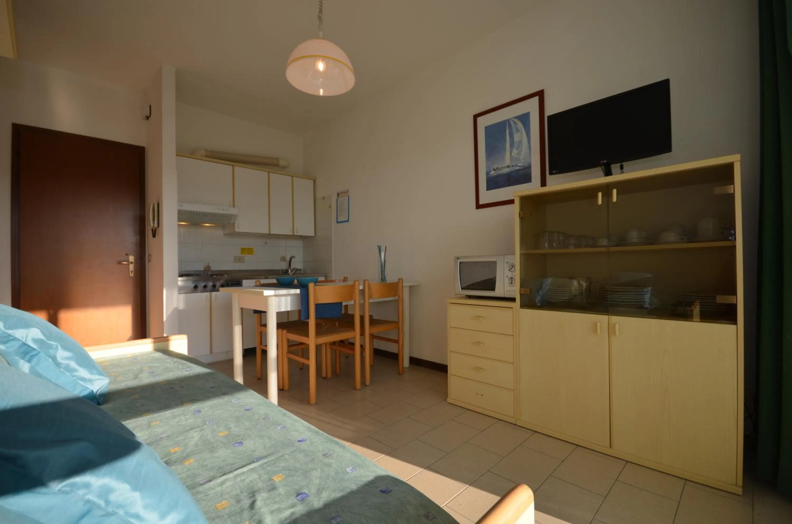 Kitchen or kitchenette in Appartamenti Acquaverde