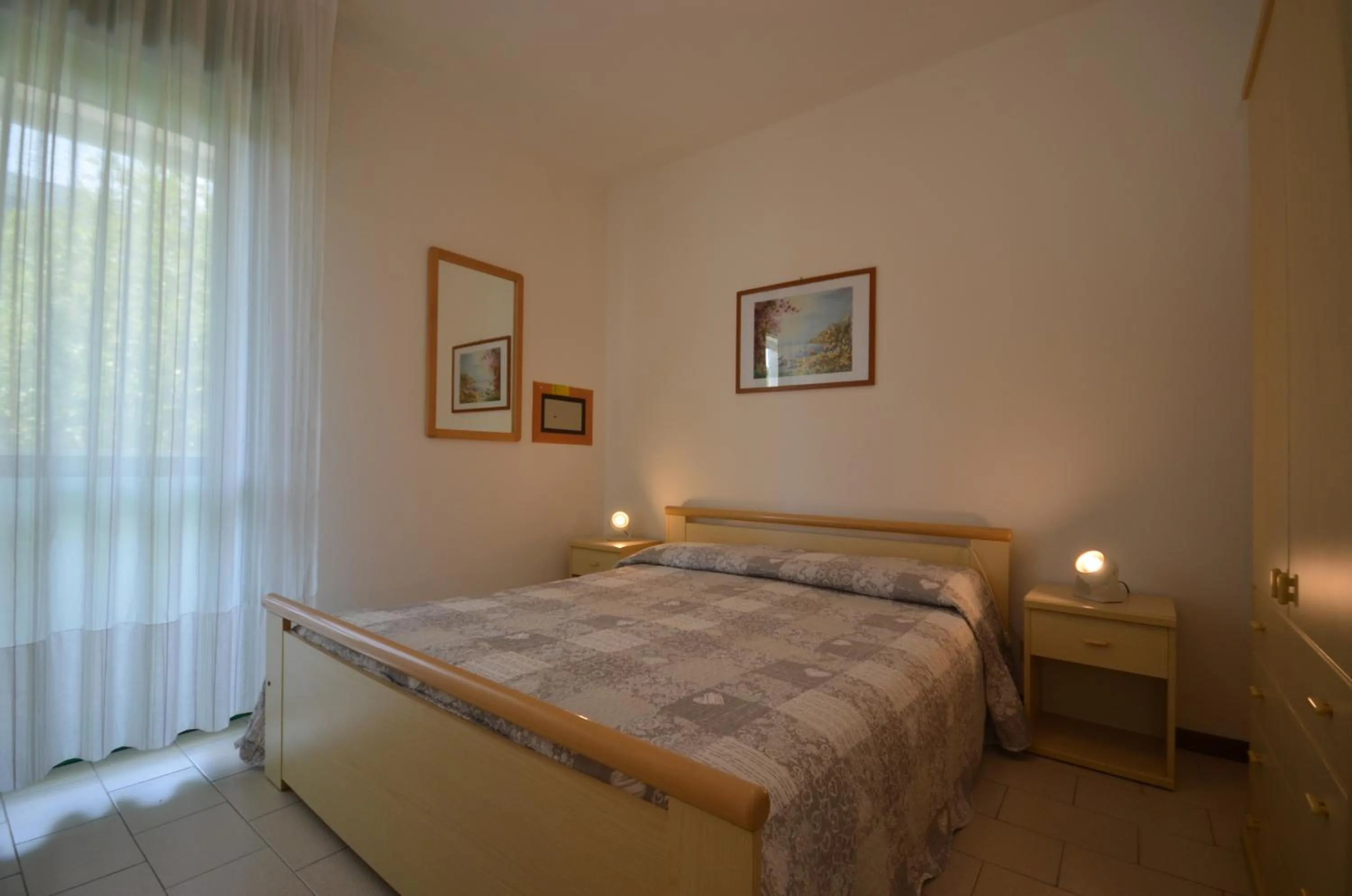 Bedroom, Bed in Appartamenti Acquaverde