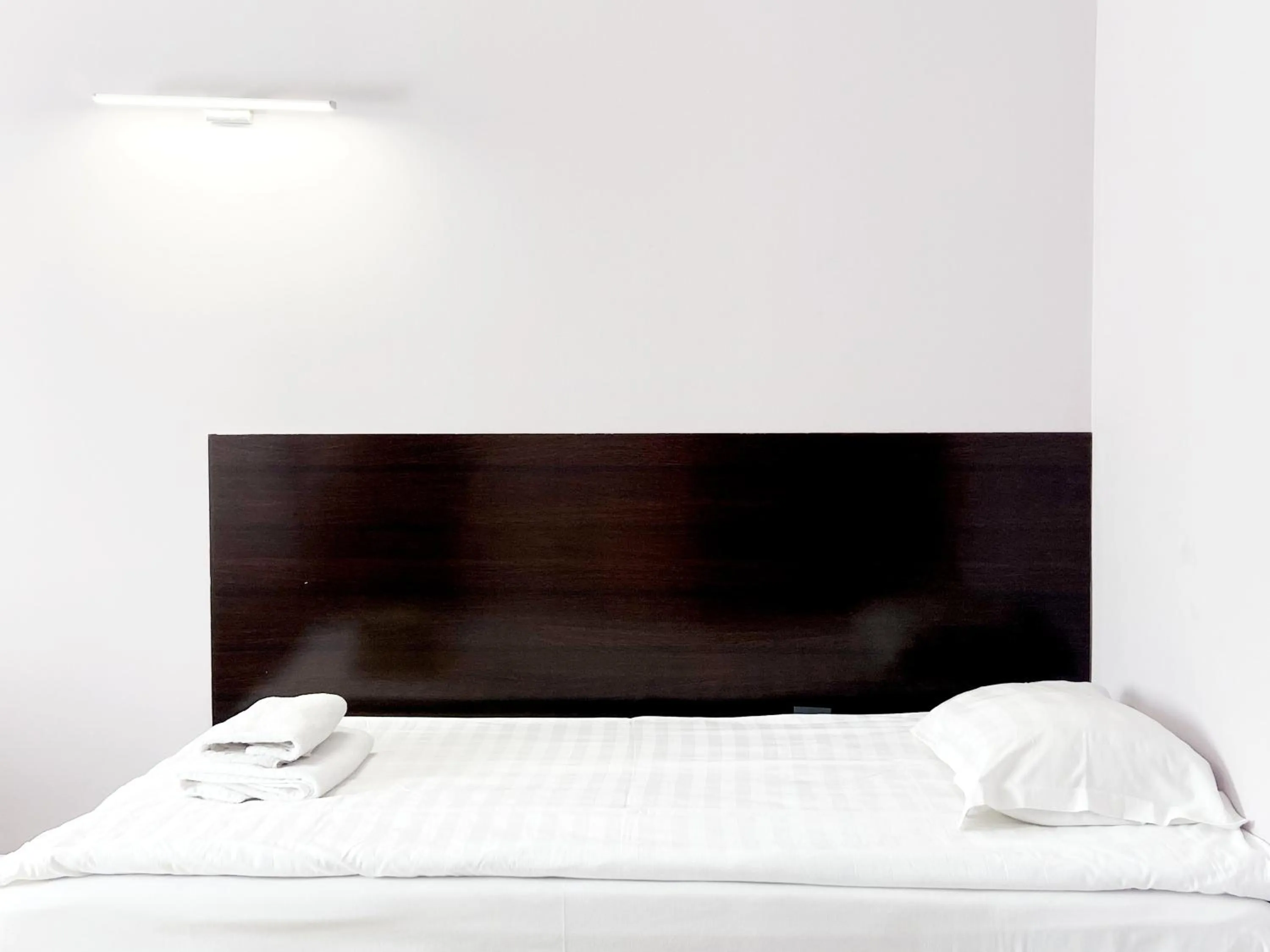 Bed in TourAsia Hotel