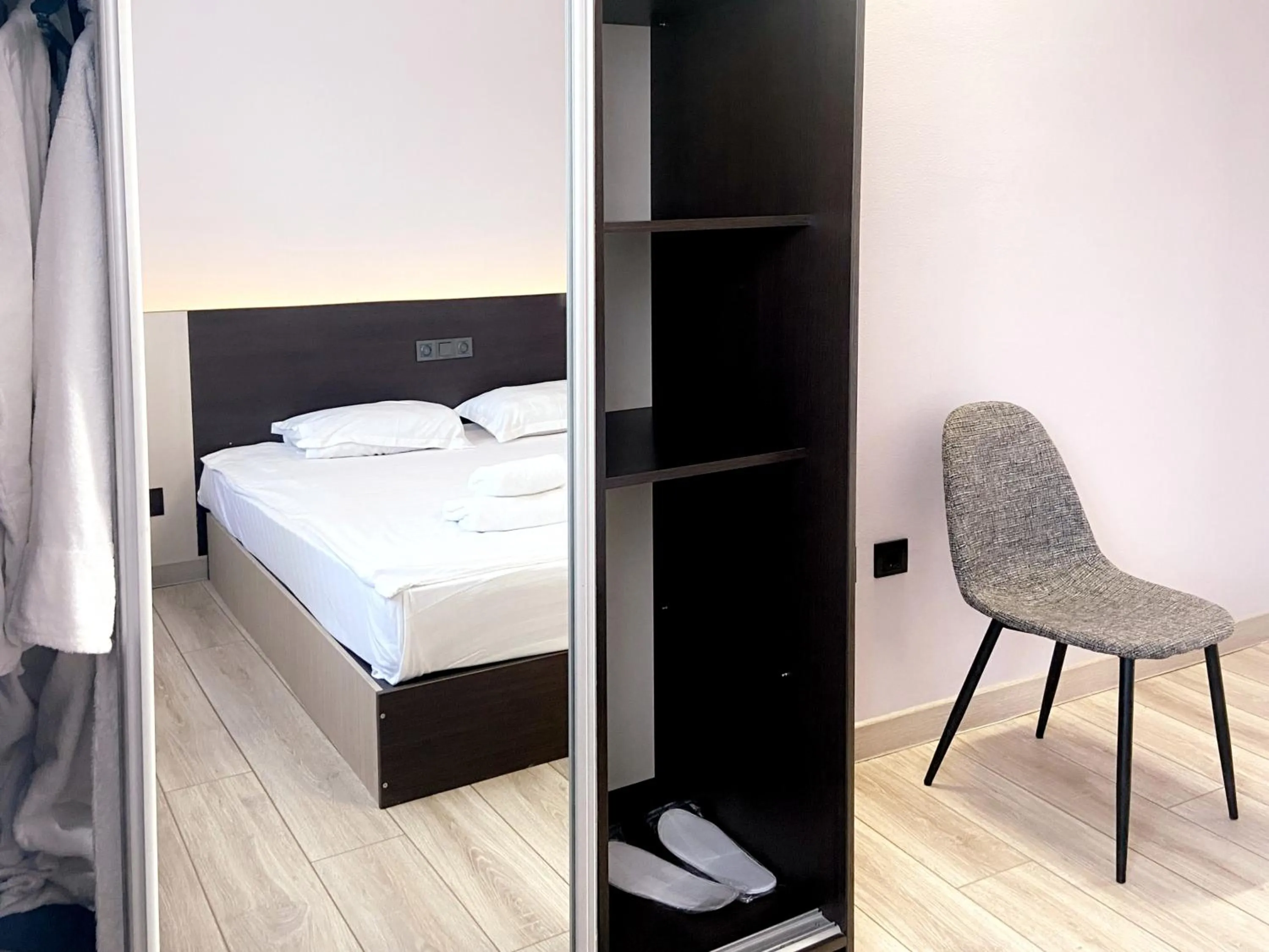 Bed in TourAsia Hotel