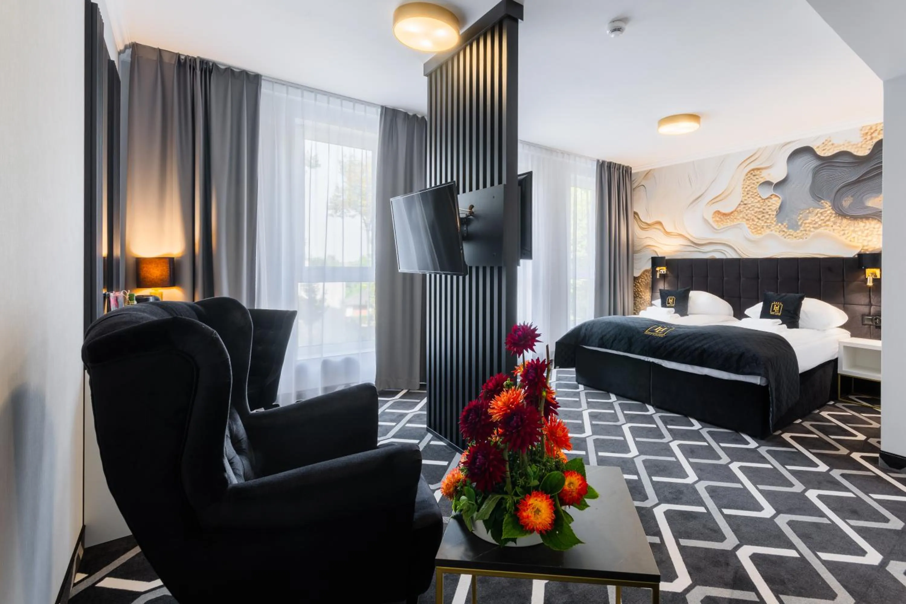 Bed in Hotel Lantier & Swimming Pool Zone