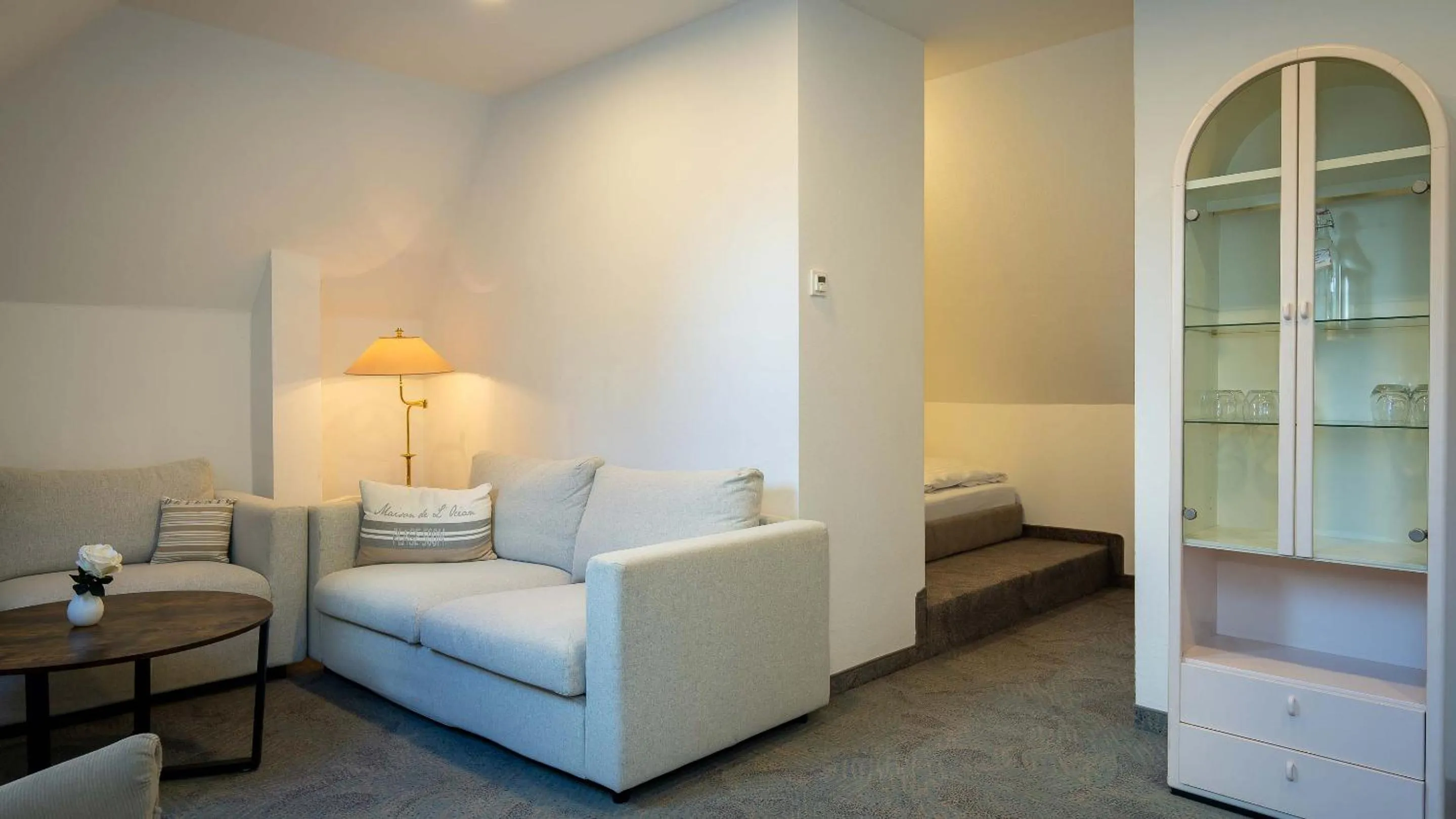 Living room, Bed in Boutique Hotel Rosengarten Hamburg