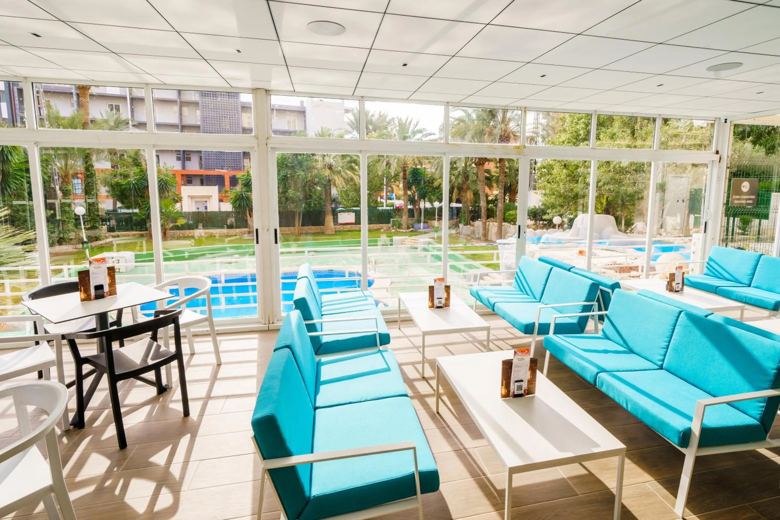 Swimming pool in Apartamentos El Faro By Mc