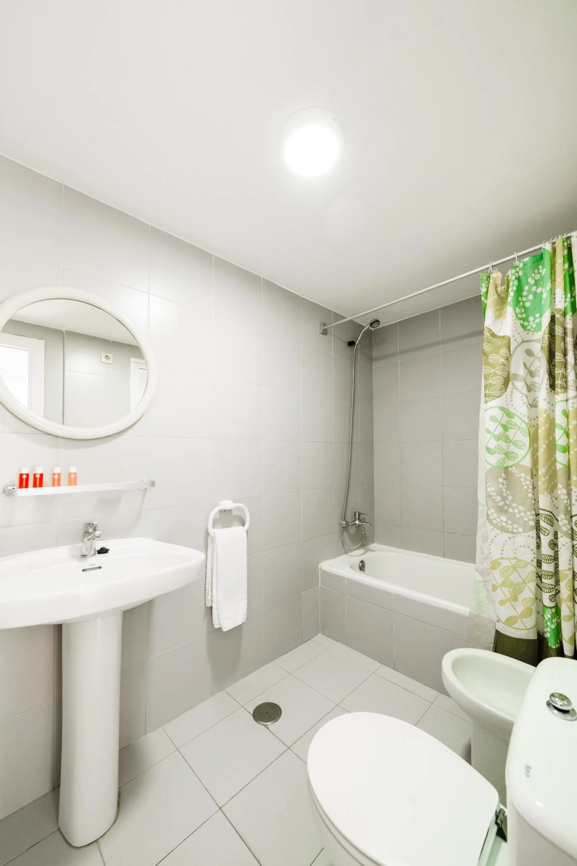 Shower in Apartamentos El Faro By Mc