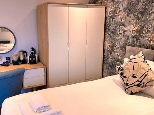 Bed in The Hillcrest Hotel