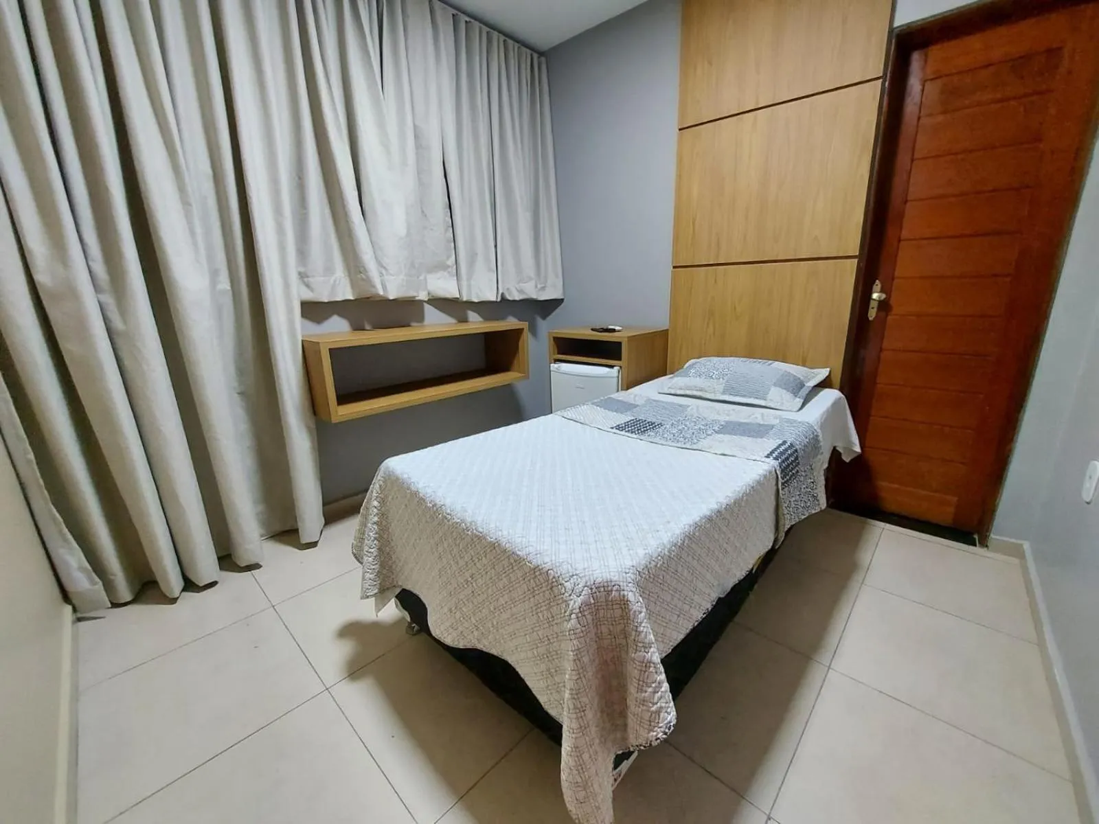 Bed in Hotel Pequeno Principe