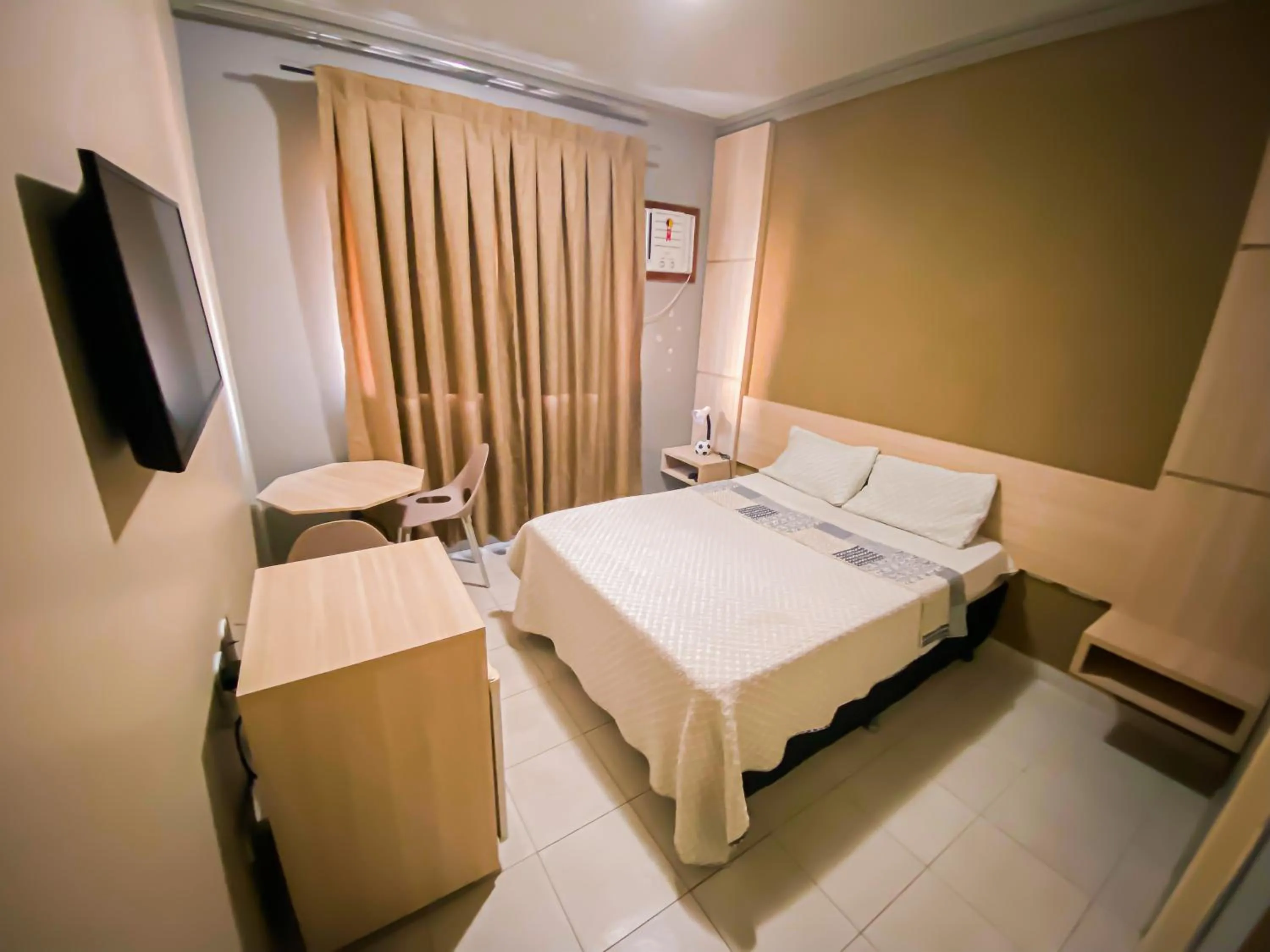 Bed in Hotel Pequeno Principe