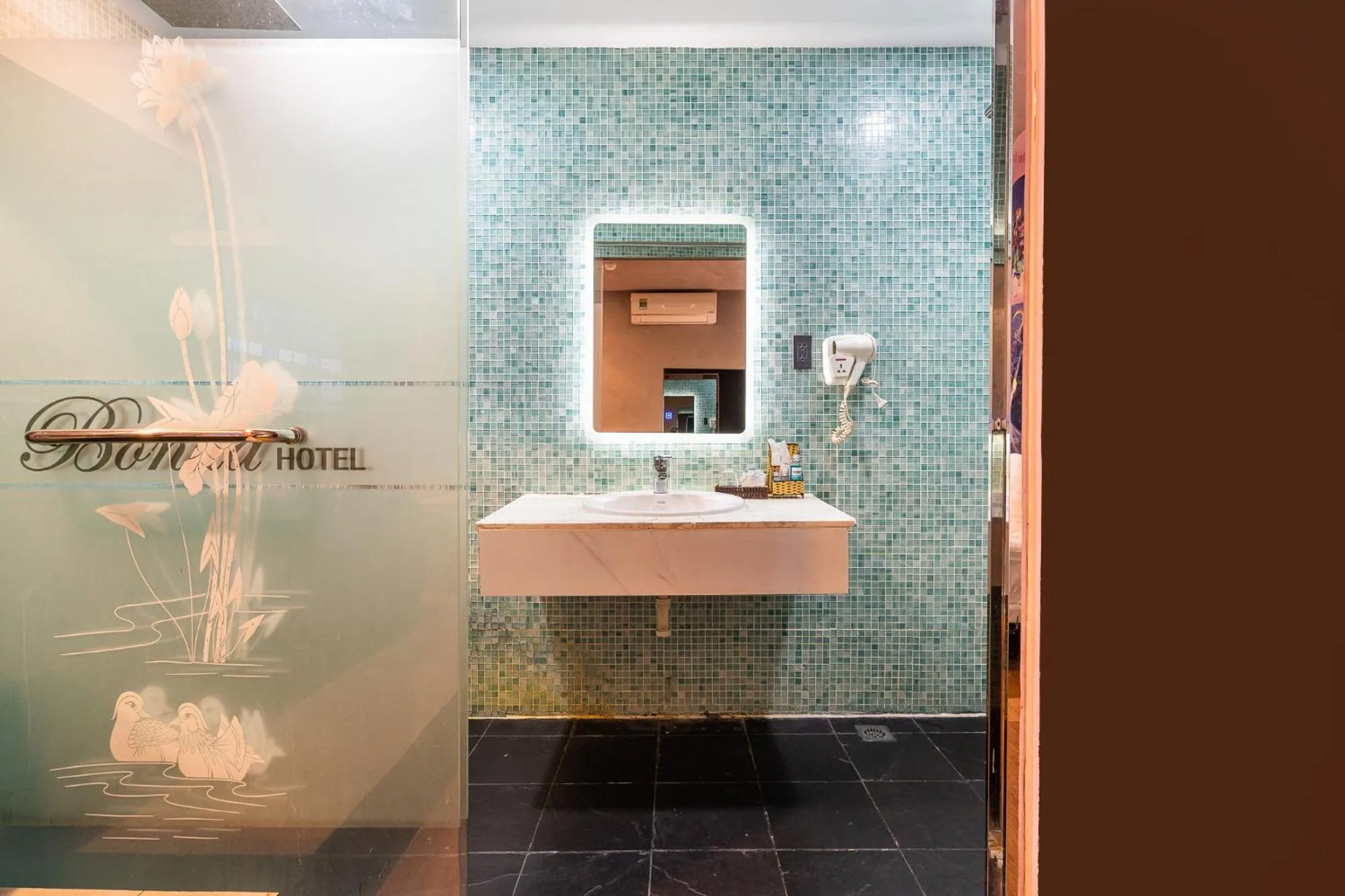 Bathroom in Collection O District 10 - Bonita Grand Hotel