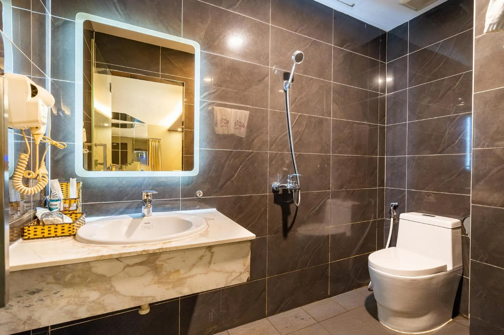 Bathroom in Collection O District 10 - Bonita Grand Hotel