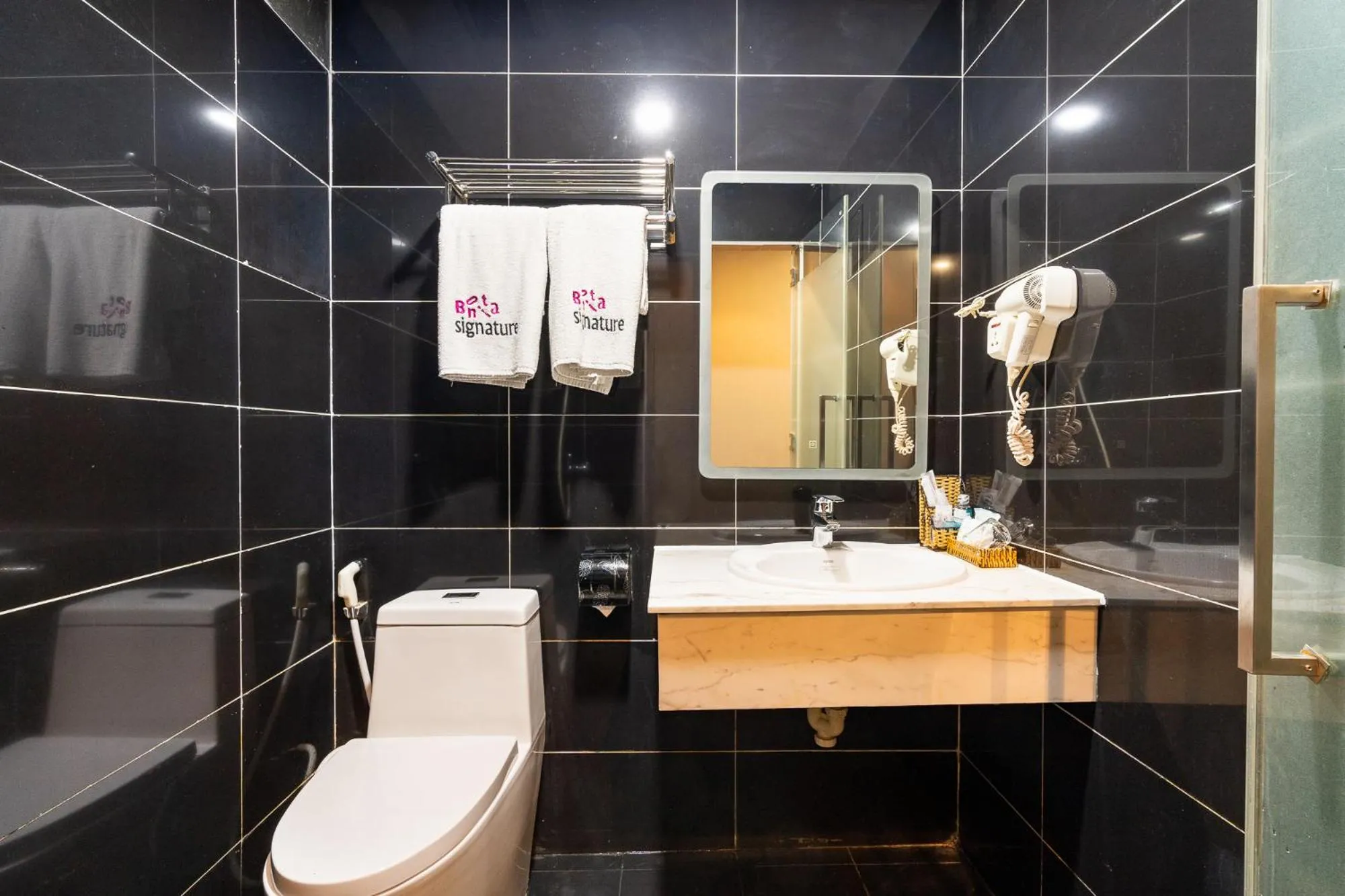 Bathroom in Collection O District 10 - Bonita Grand Hotel