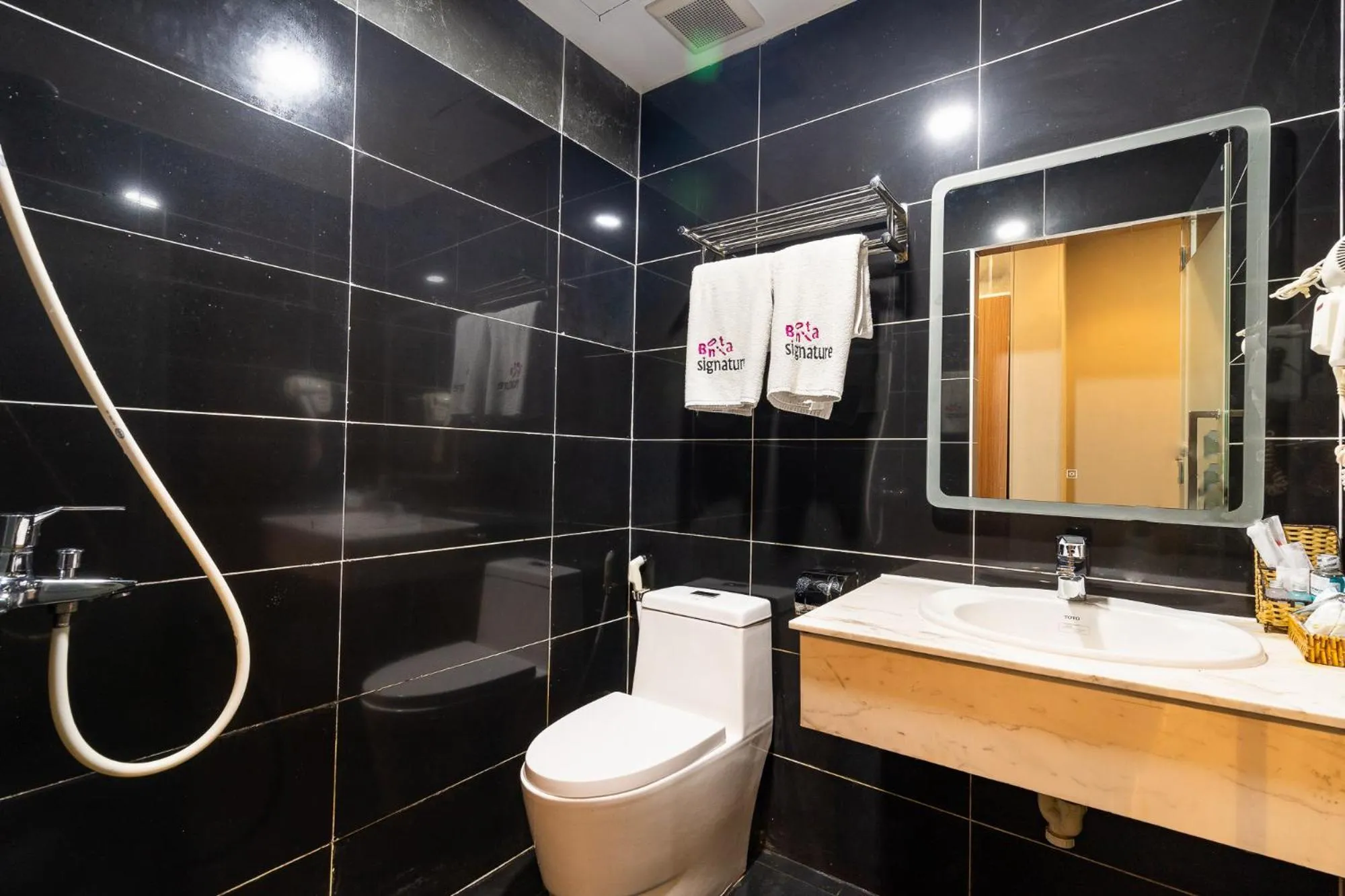 Bathroom in Collection O District 10 - Bonita Grand Hotel