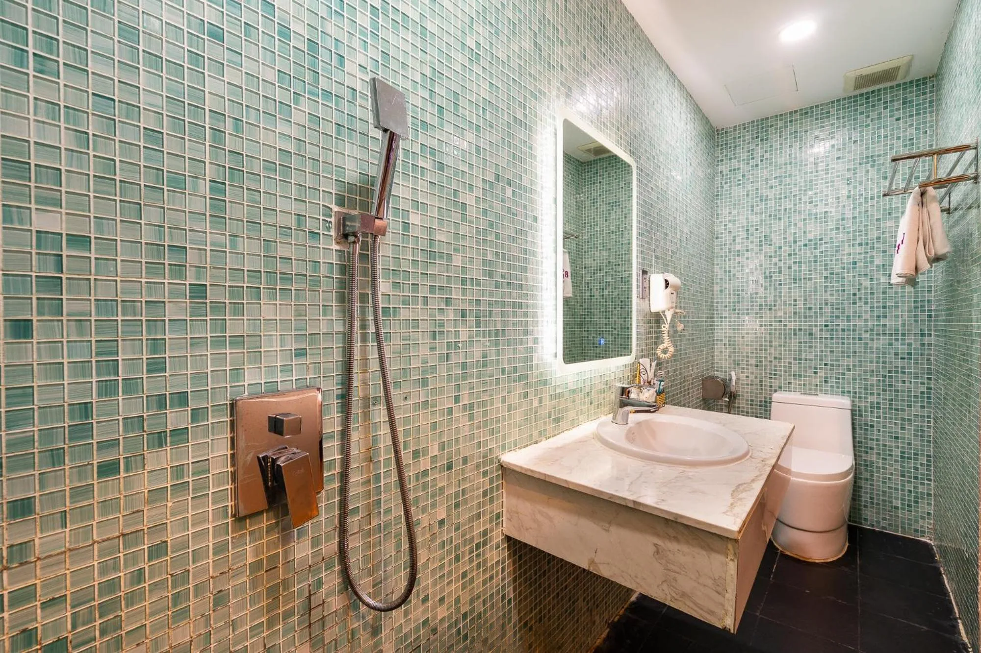 Bathroom in Collection O District 10 - Bonita Grand Hotel