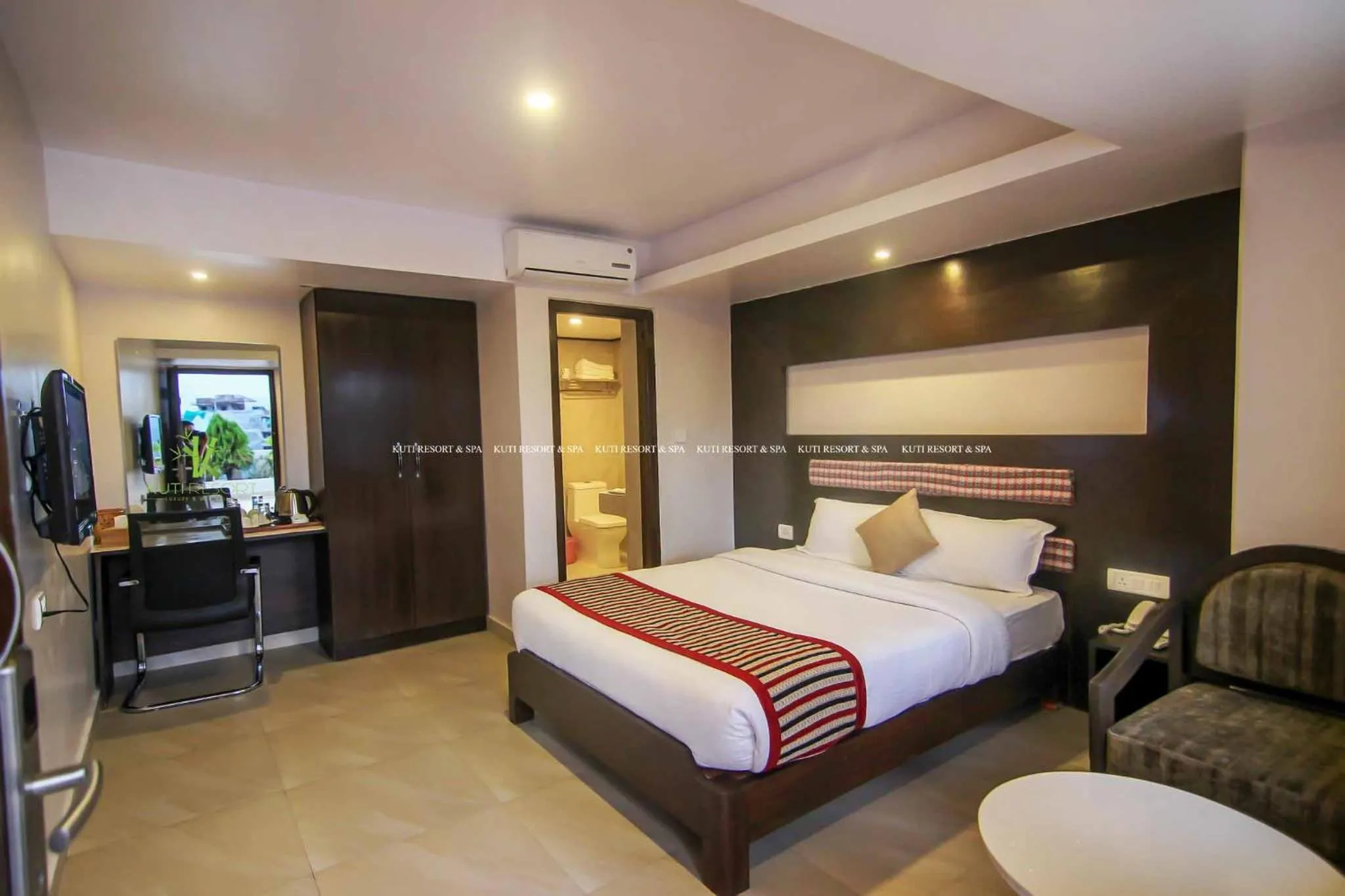 Bed in Kuti Resort & Spa