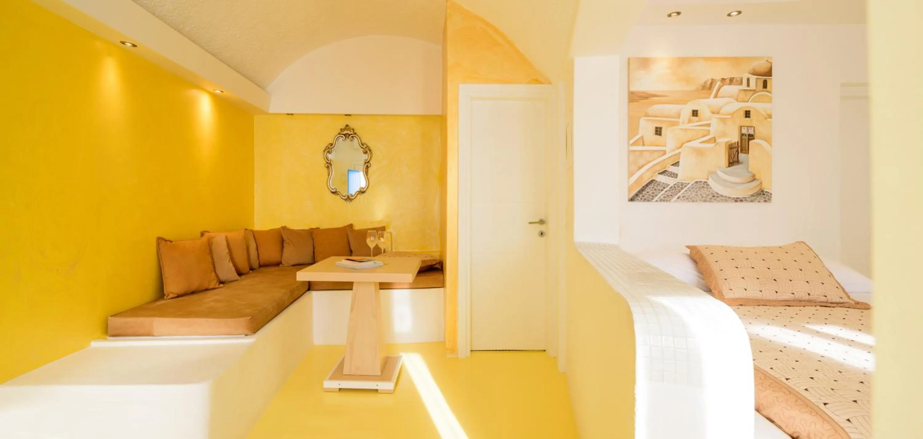 Bed in Abyssanto Suites and Spa