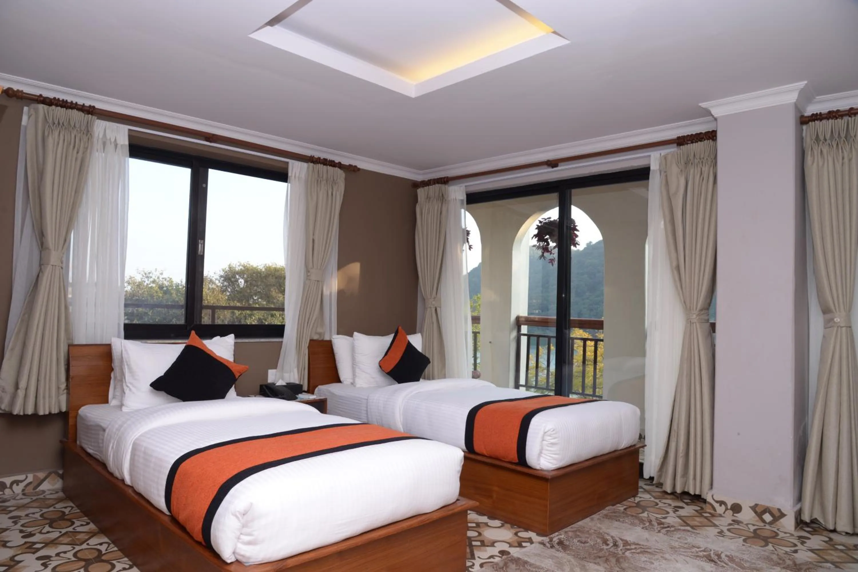 Bed in Hotel Raniban Arcade