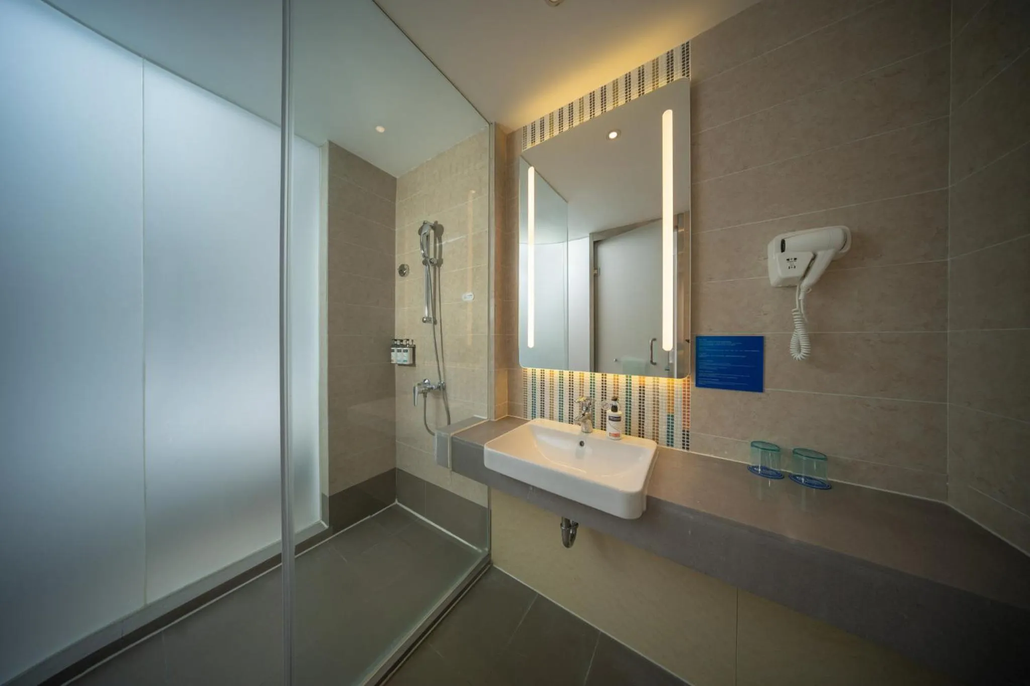 Bathroom in Holiday Inn Express Shanghai Pujiang by IHG
