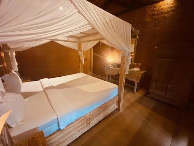 Bed in Sing Sing Resort Lovina