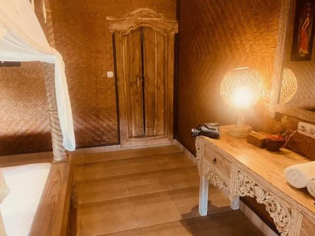 Bed in Sing Sing Resort Lovina