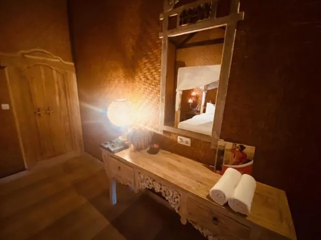 Bed in Sing Sing Resort Lovina