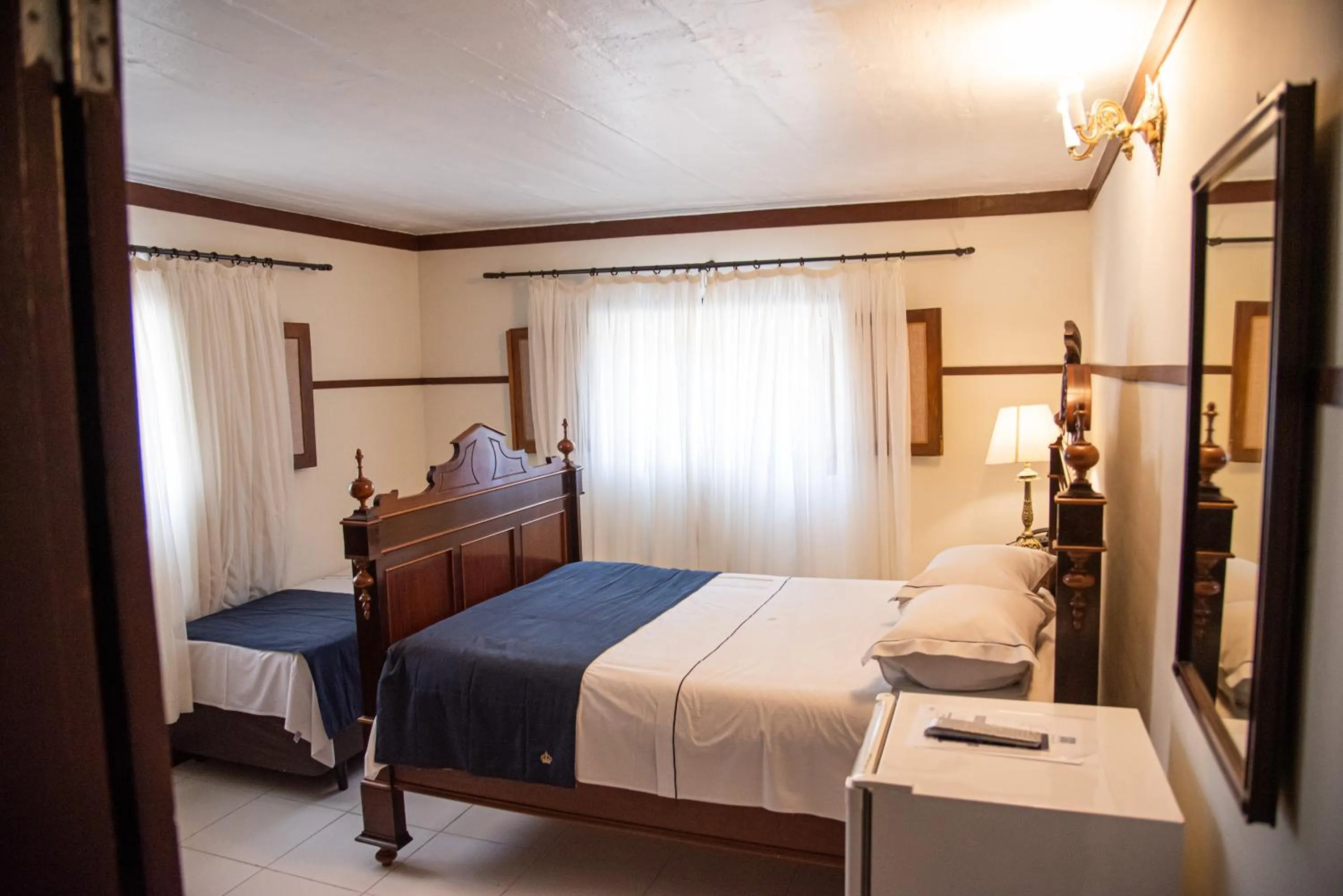 Bedroom, Bed in Pousada Dom Petrópolis