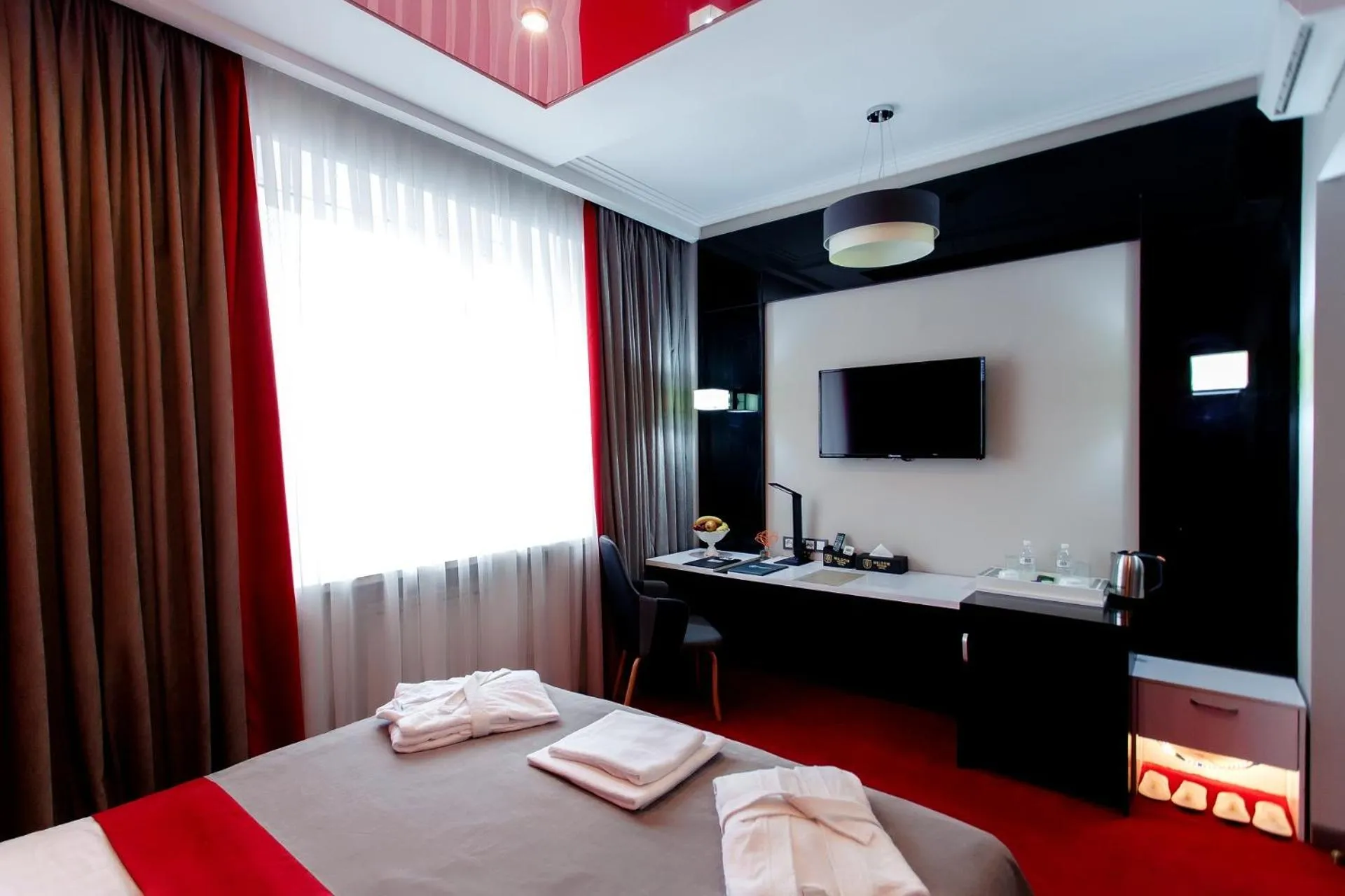 Decorative detail, Bed in Mildom Premium Hotel