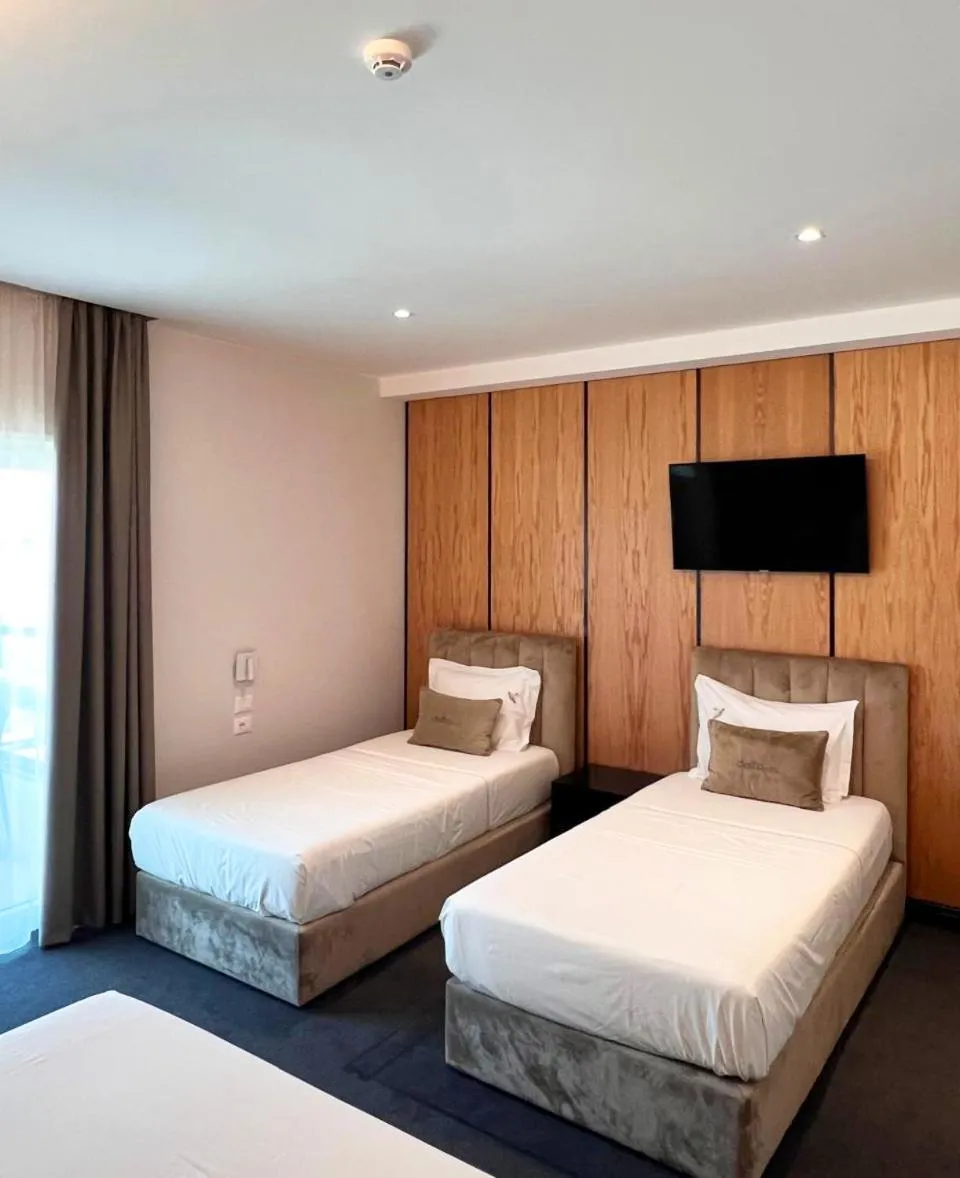 Bed in Hotel Delta Premium