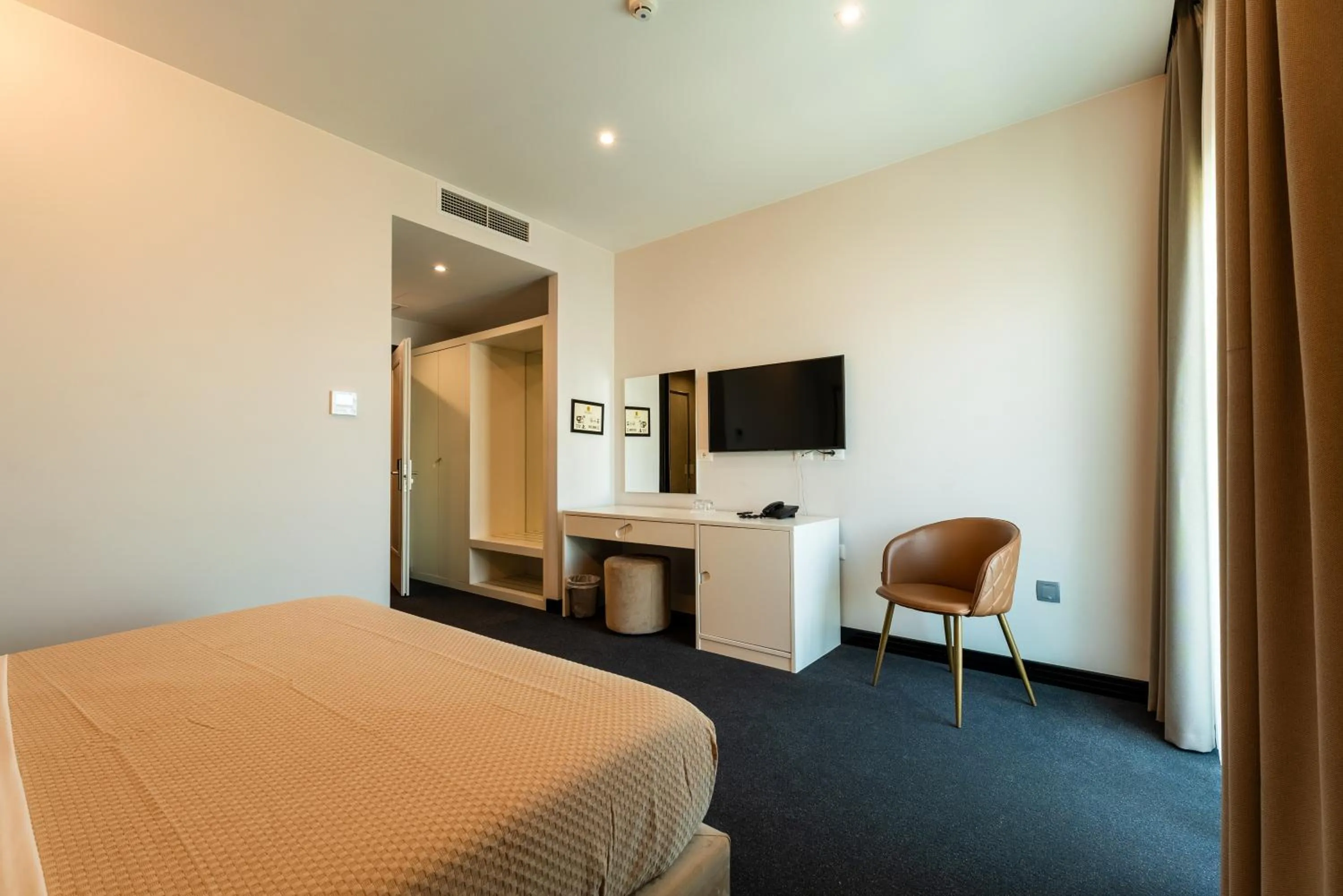 Bed in Hotel Delta Premium