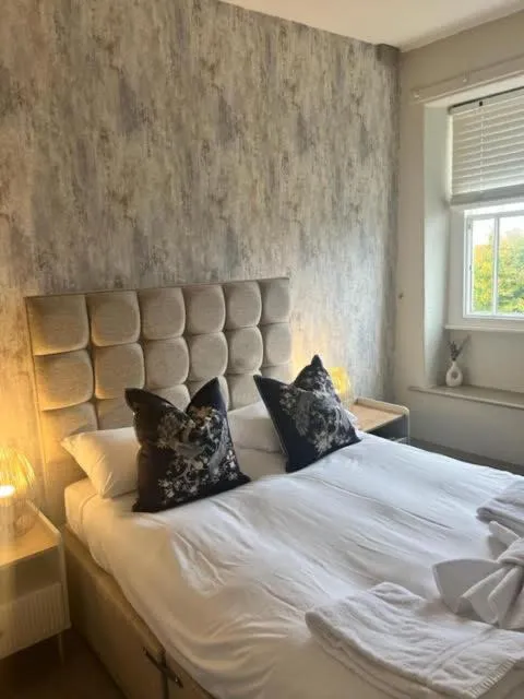 Bed in The Commodore Inn