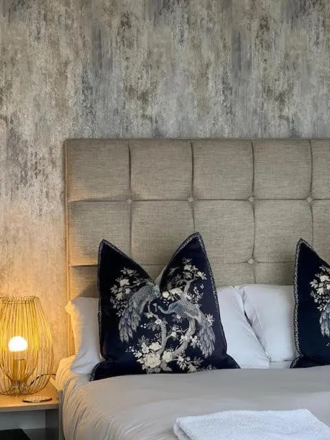 Bed in The Commodore Inn