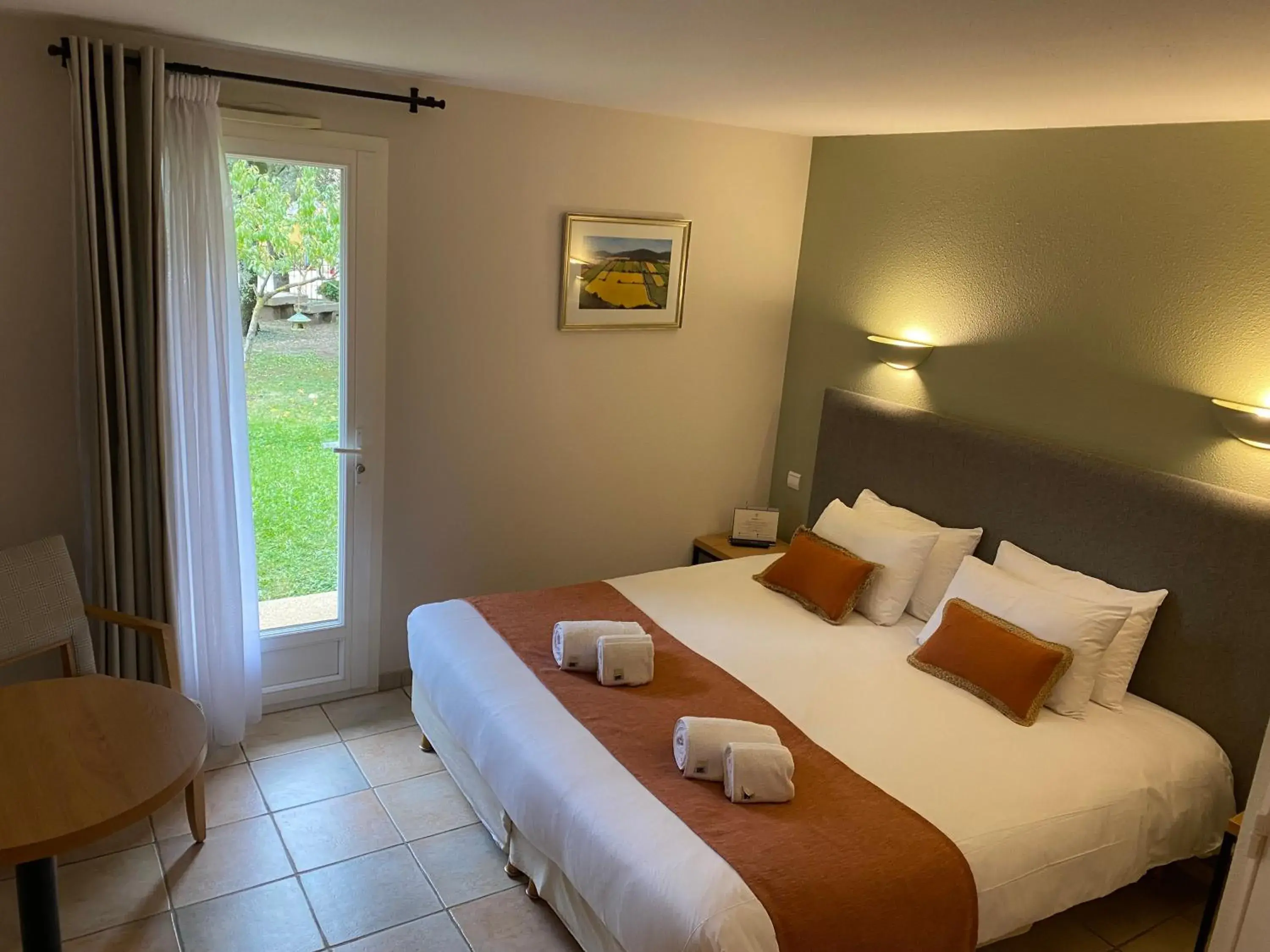 Double Room on the Ground Floor - View of the Garden in La Bastide De Grignan Hotel & Restaurant Double Room on the Ground Floor - View of the Garden in La Bastide De Grignan Hotel & Restaurant