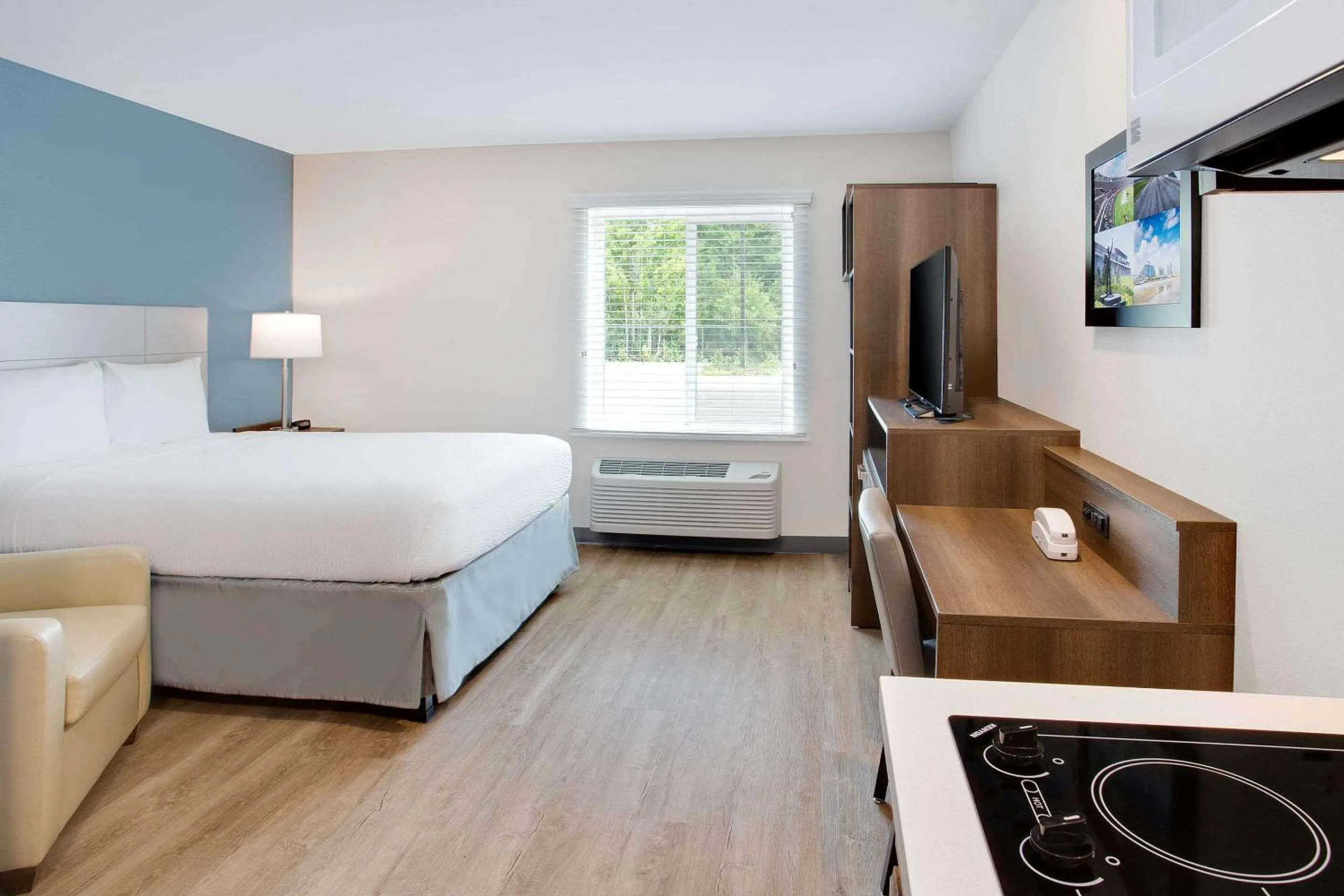 Photo of the whole room, Bed in WoodSpring Suites Daytona Beach Int'l Speedway