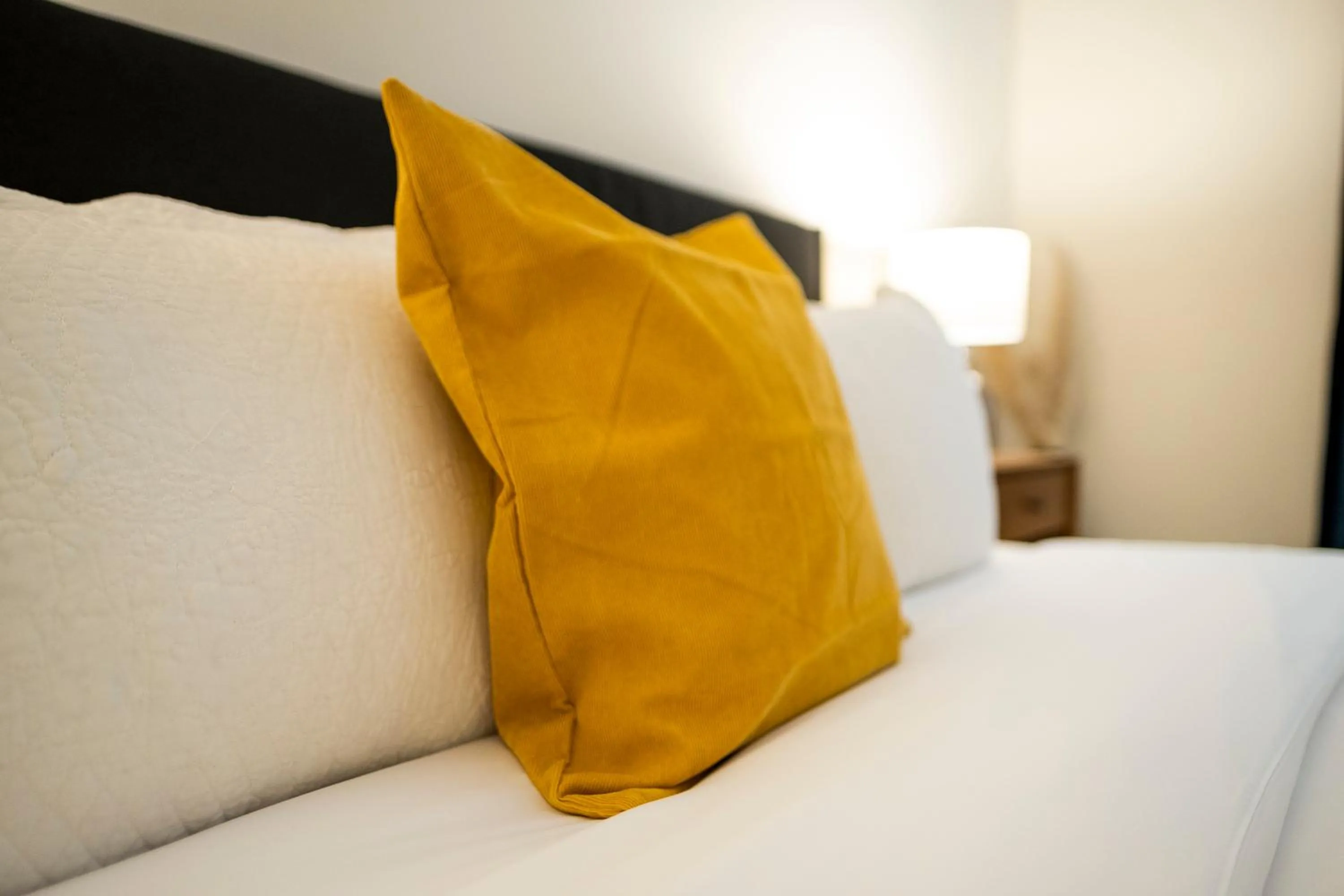 Bed in The Francis Boutique Inn