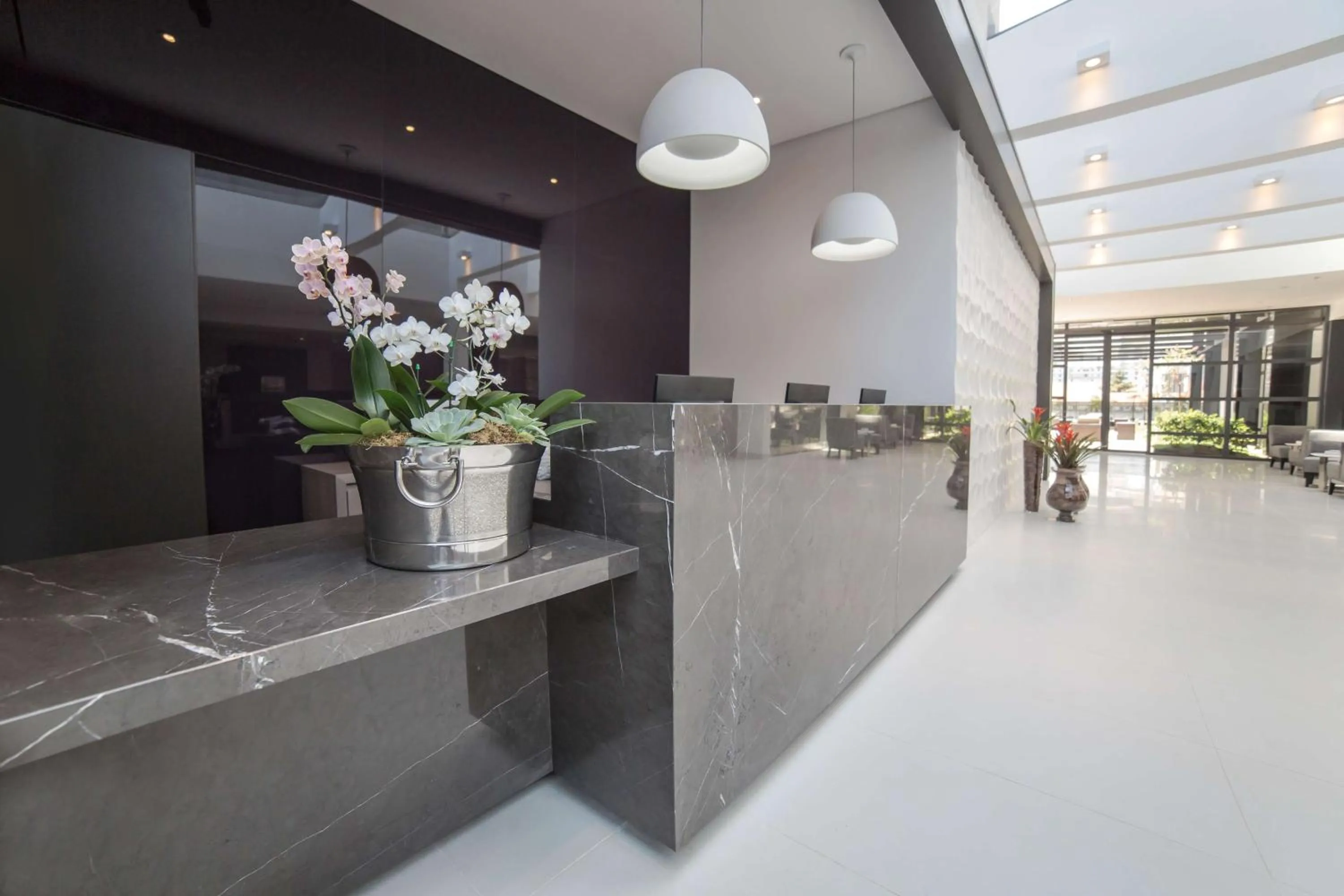 Lobby or reception in NH Collection Curitiba
