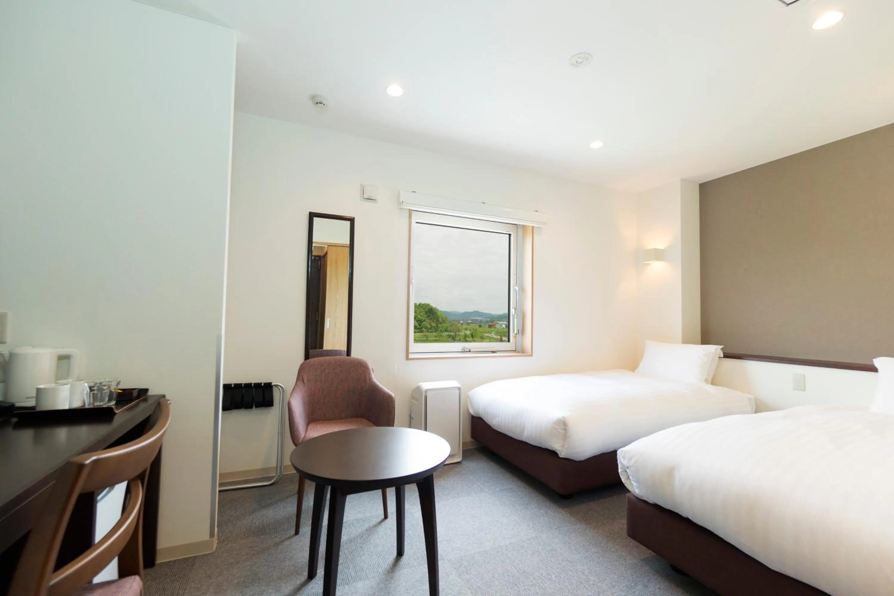 Photo of the whole room, Bed in Mikasa Tennen Onsen Taikonoyu Sparesort Hotel Taiko Bettei Hatago