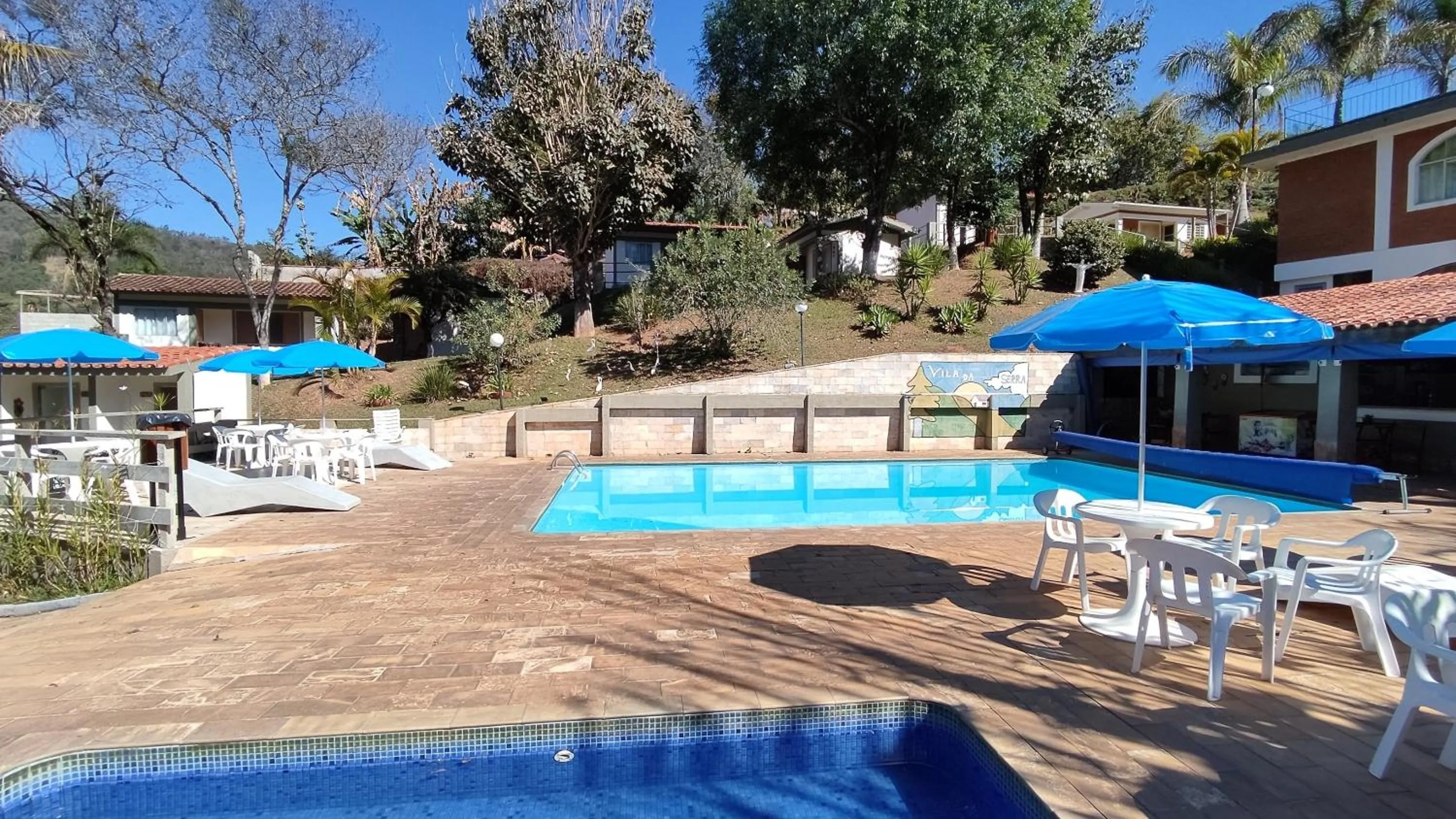 Pool view in Chalés Vila da Serra